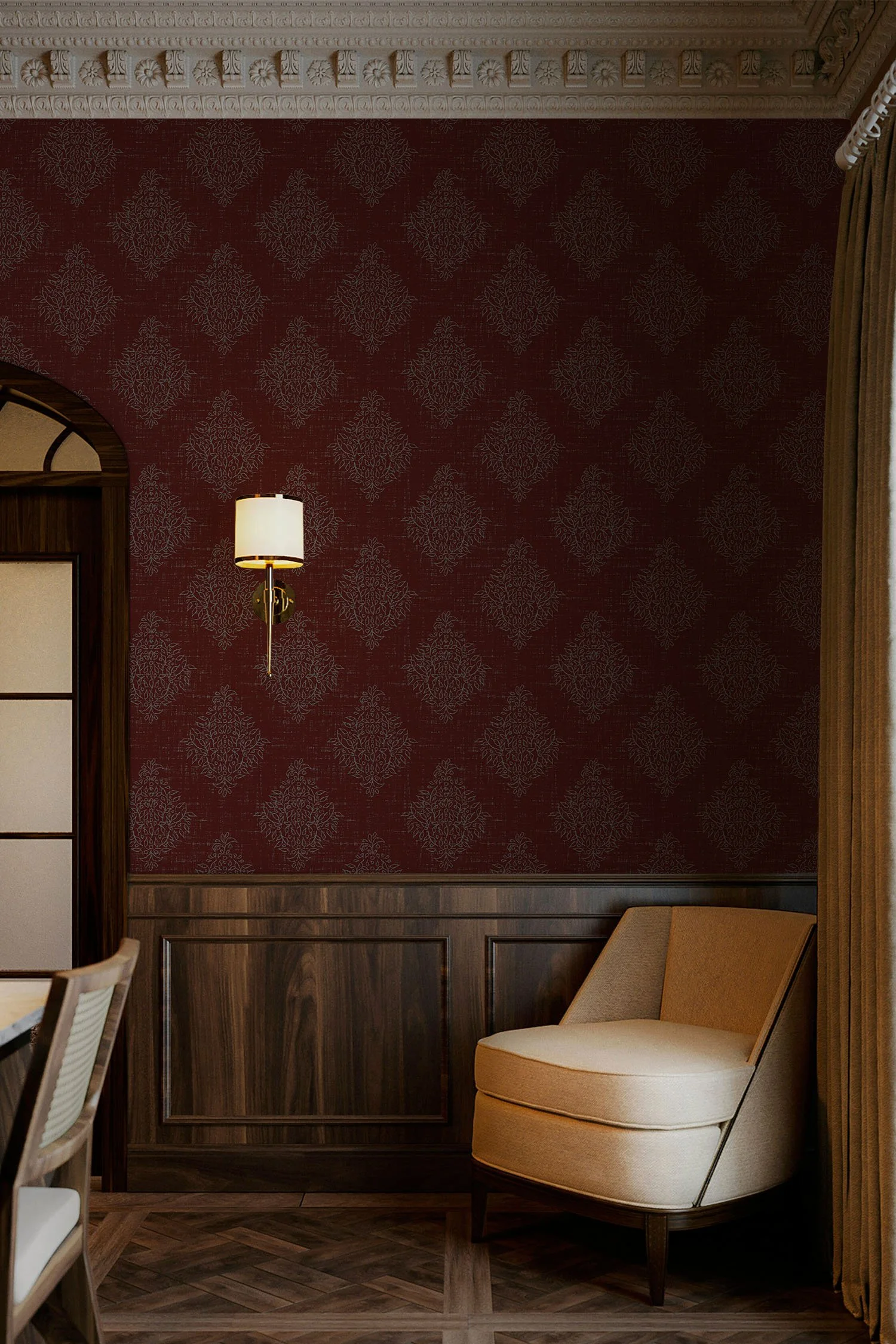 Deep maroon Quiet Garden Damask wallpaper with dusty blue botanical motifs in a traditional room with dark wood paneling, ornate molding and a cream upholstered chair.