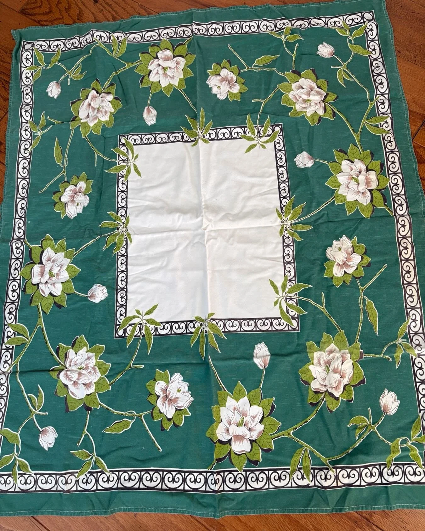 What a great vintage tablecloth