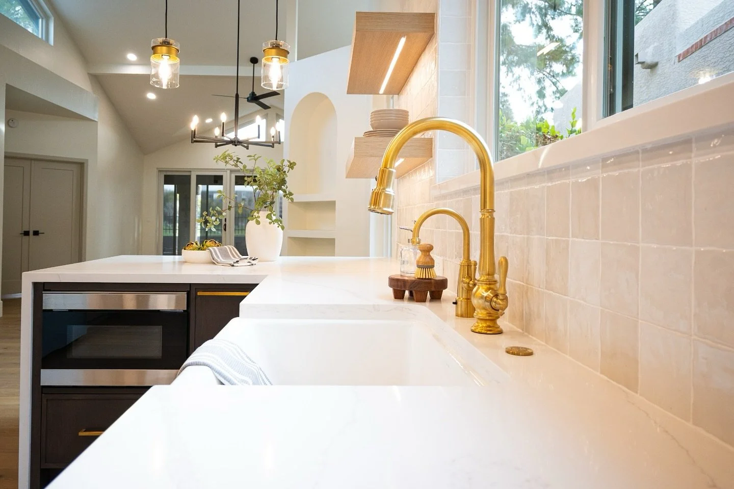 ✨ Purposeful Details Make All the Difference ✨
This kitchen is a beautiful blend of timeless finishes and intentional functionality &mdash; from the warm brass fixtures to the layered textures and custom lighting. Every element was thoughtfully chose