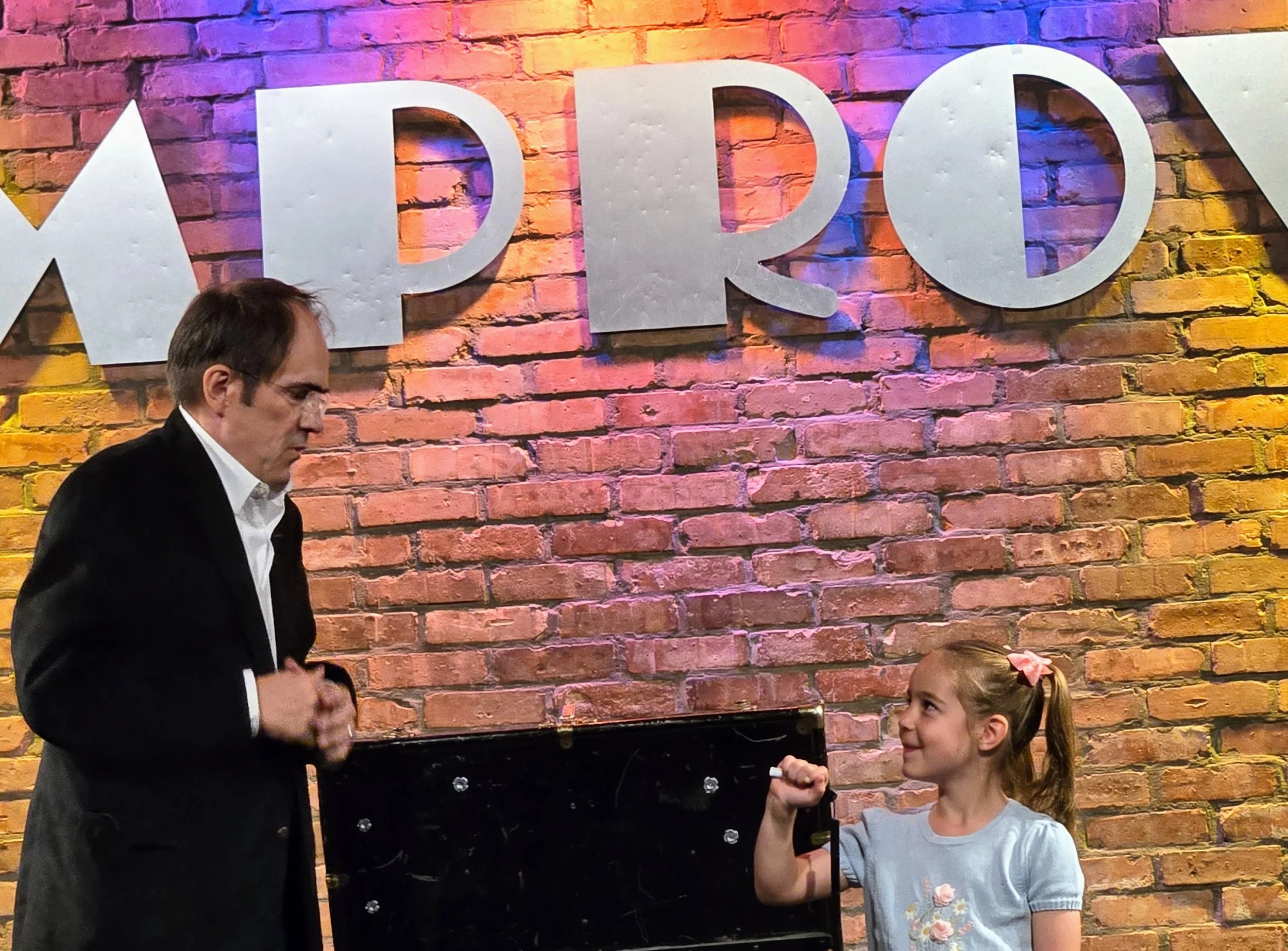 happy kid doing magic