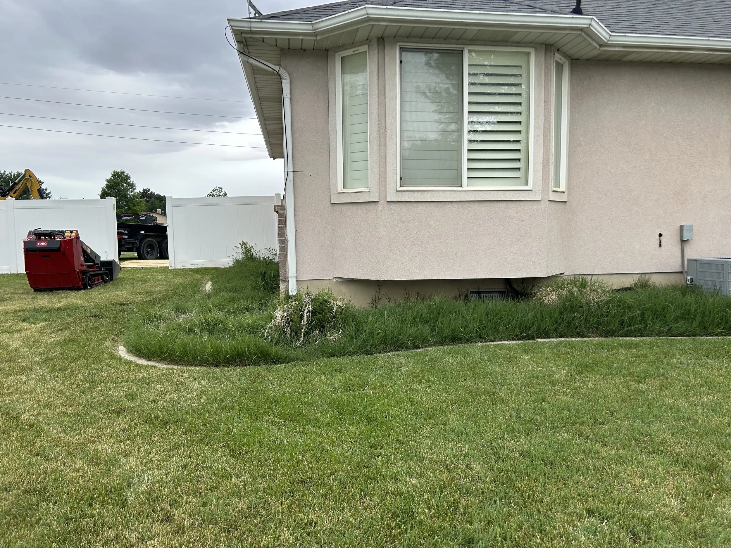 Flower garden remodel with decorative rock in West Bountiful, Utah