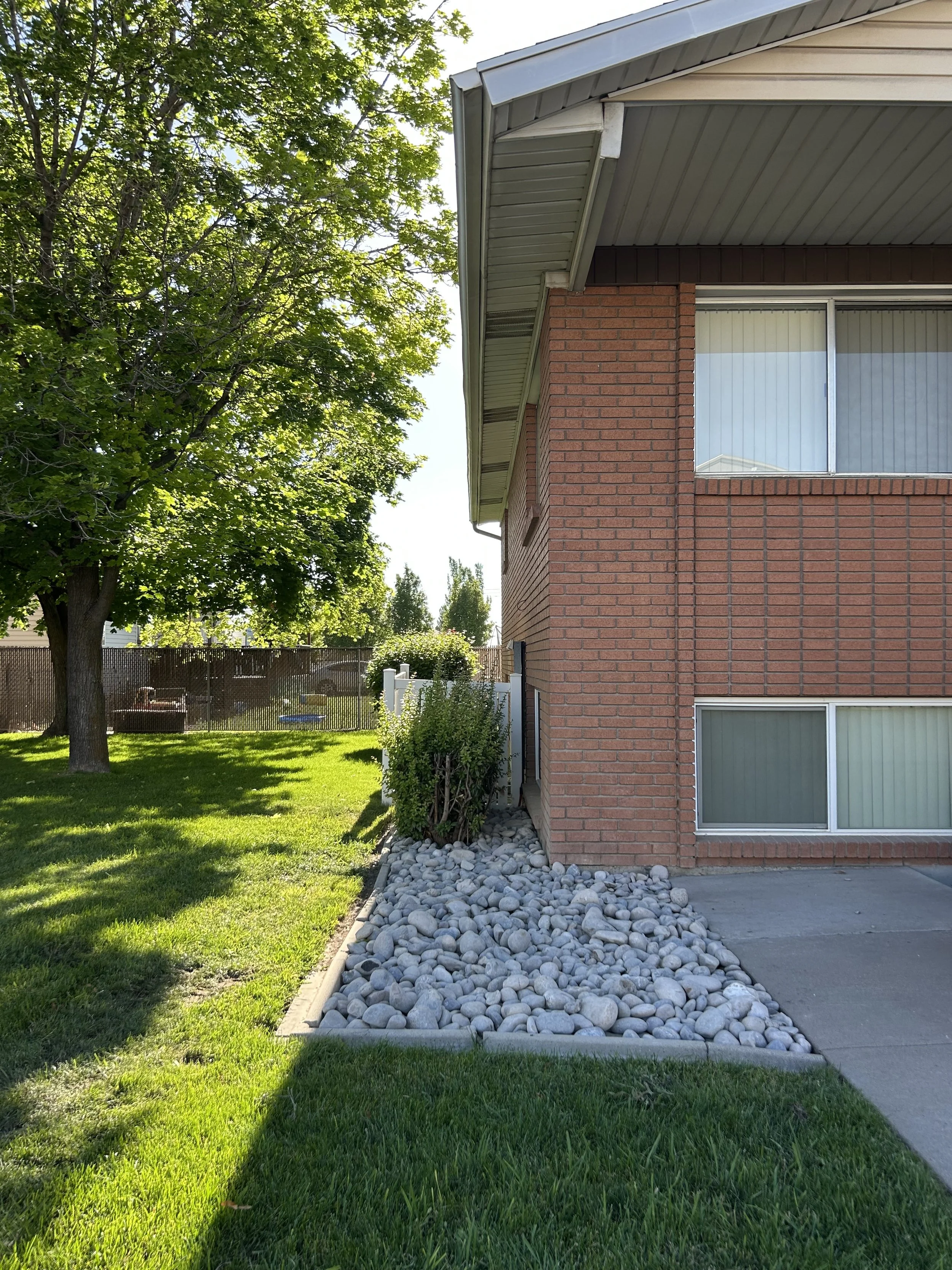 Rock landscaping installation for improved curb appeal