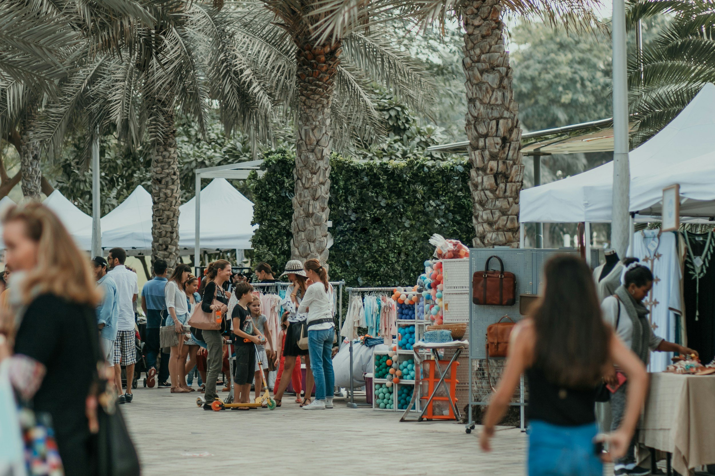 Outdoor market/event, people attending