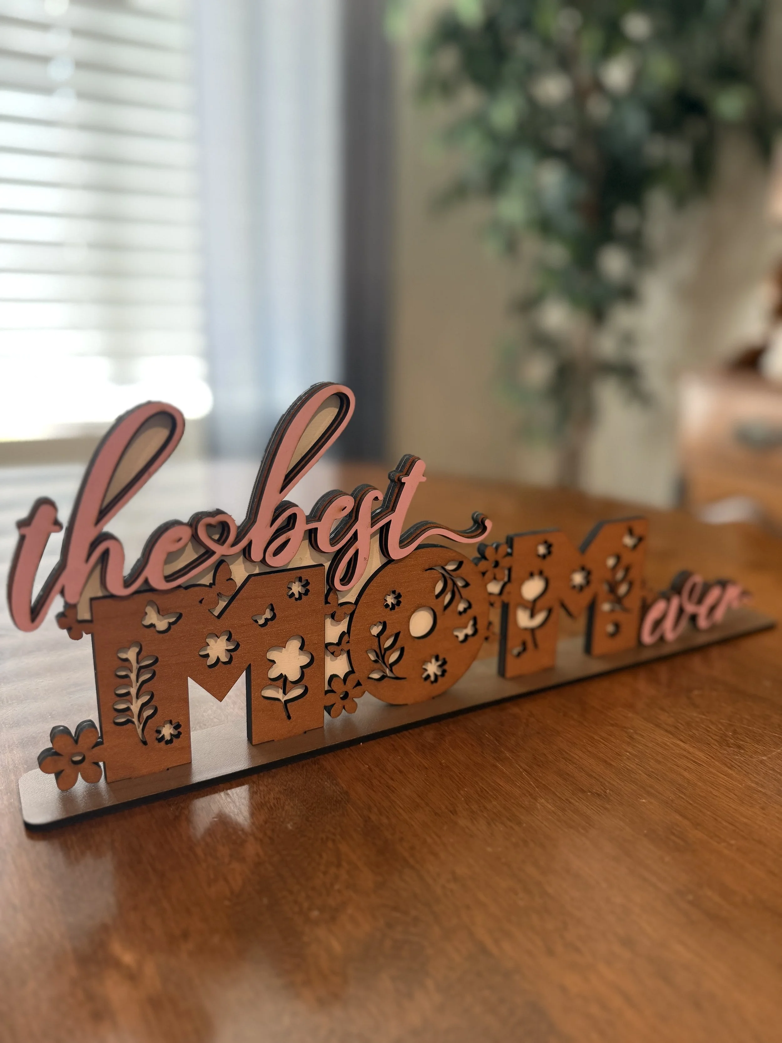 The best mom ever deserves a sign telling her so in pink, white, and cherry
