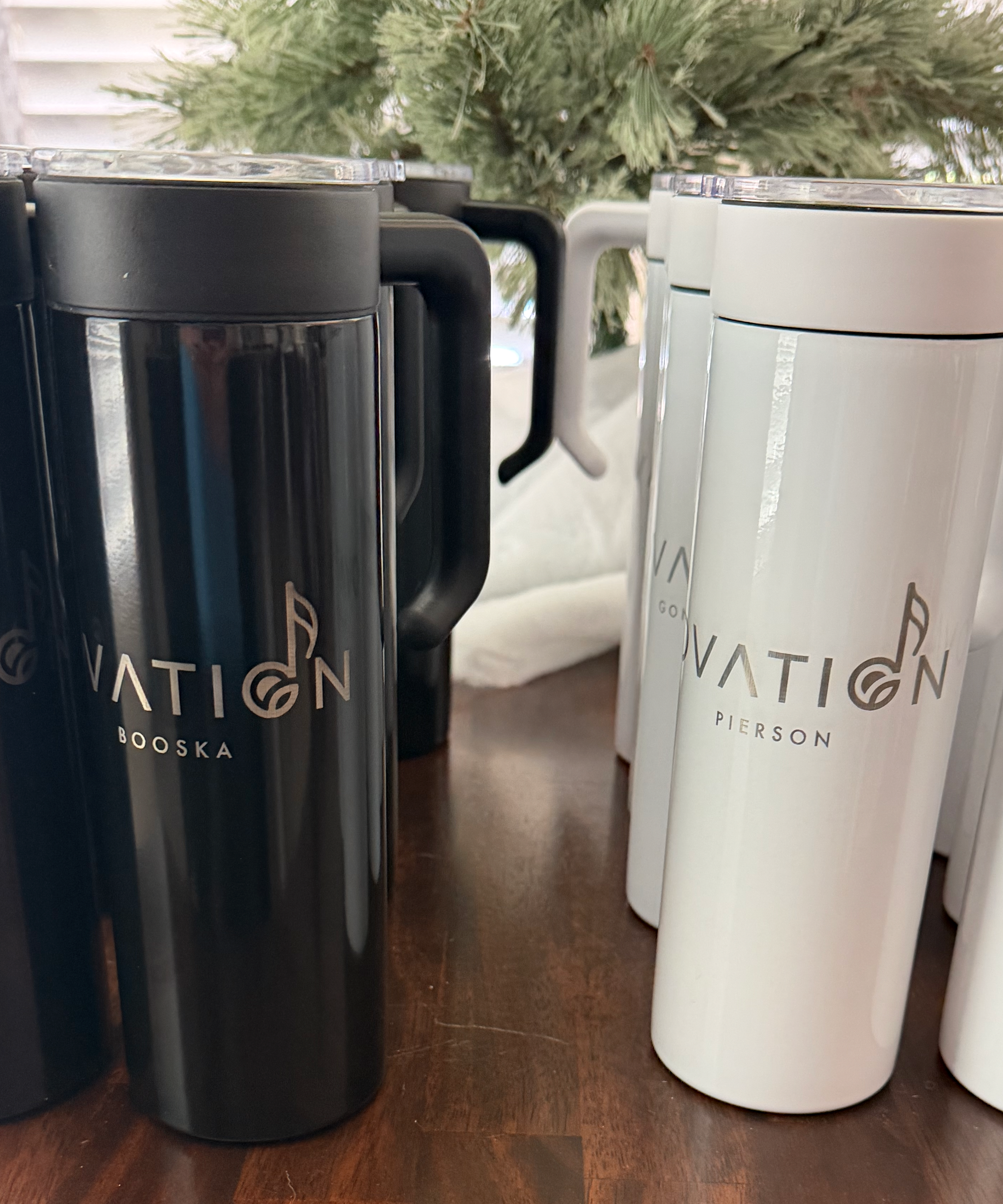 This is another example of our 20 oz tumblers. In this case, our customer needed 67 in 8 of the 14 colors. They matched the handles to the tumbler. Each cup features a unique name, along with the group's name.