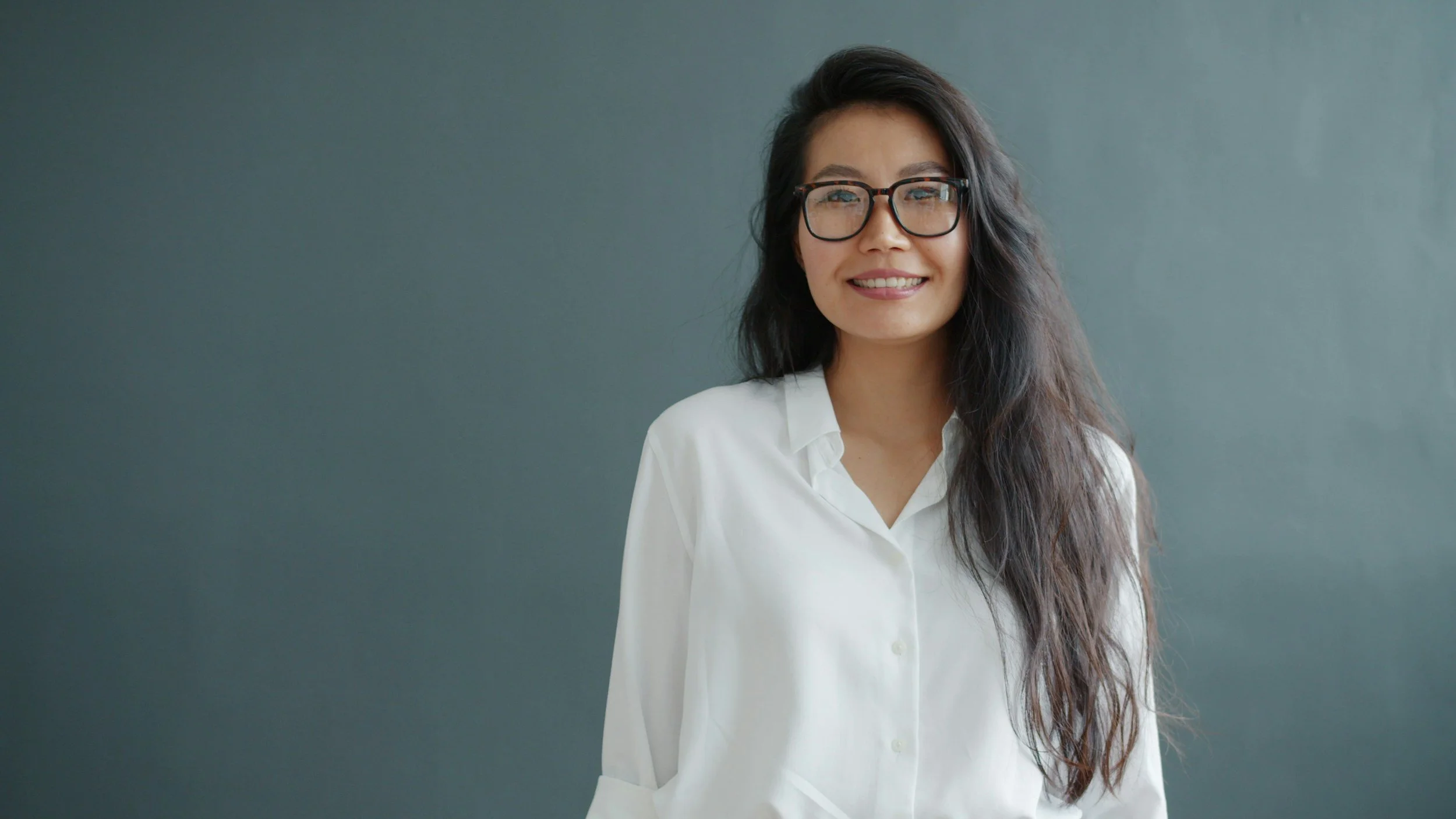 Portrait of a Marvern Ventures team member smiling, representing the team behind Marvern's real estate investor tools and support.
