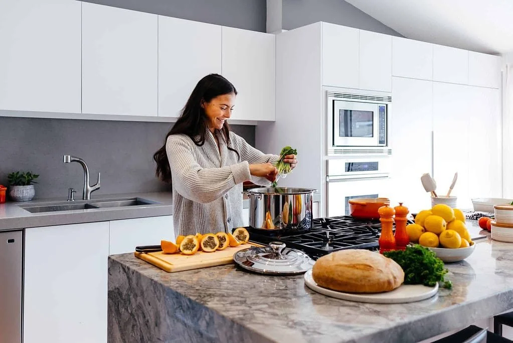 Woman preparing a simple morning drink as part of a healthy daily routine
