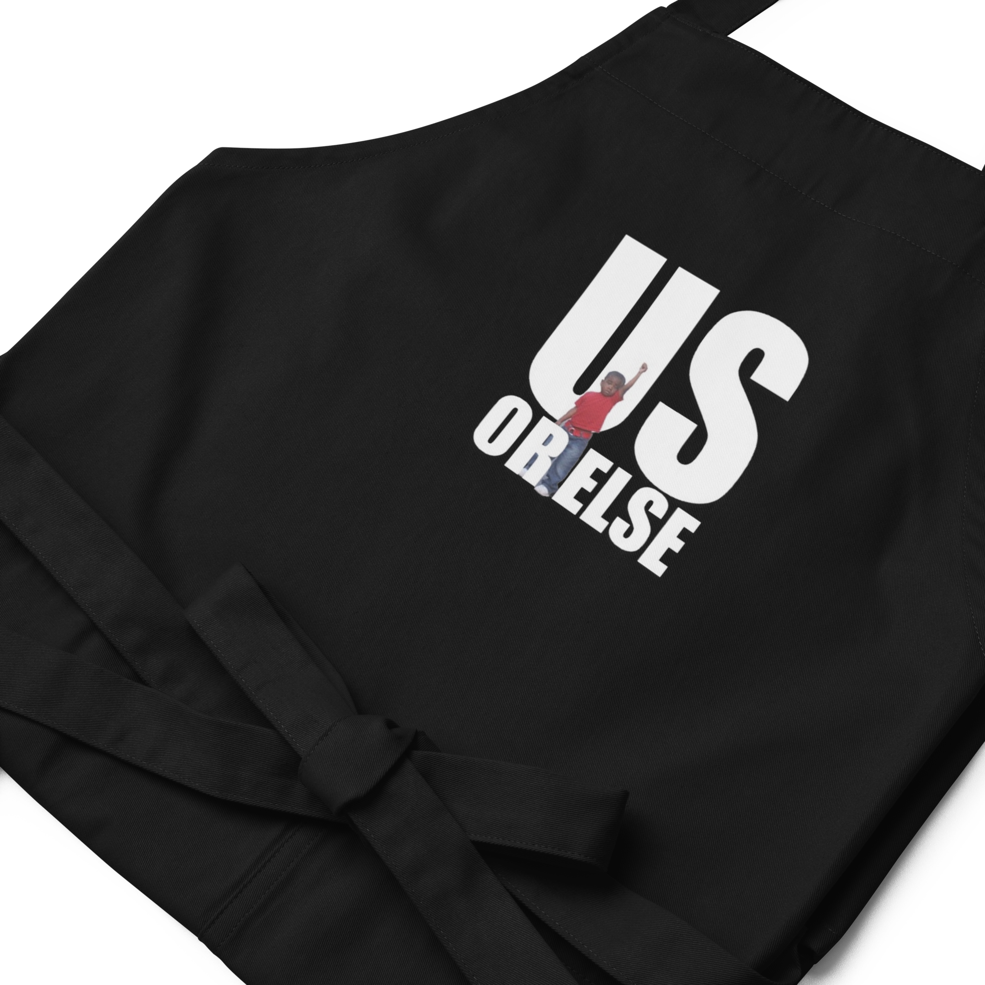 organic-cotton-apron-black-zoomed-in-6a21ee32c0c9f.png