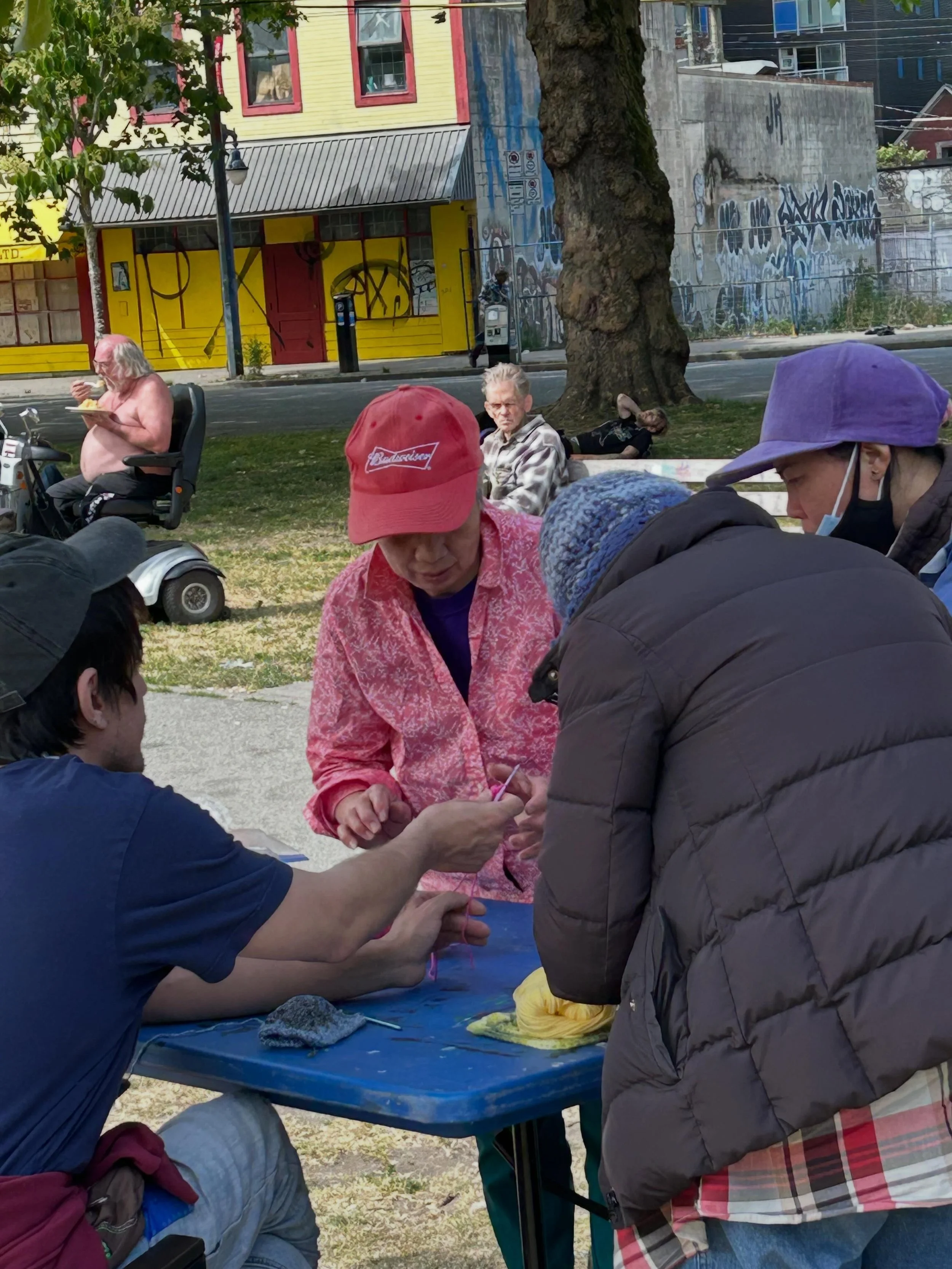 the Bario down in east Vancouver;
Mimi learned a granny square.

Hooks and yarn build a reputation 
Like sugar doughnuts at the county fair.

Thank you @cranberry_virgin this event really matters!