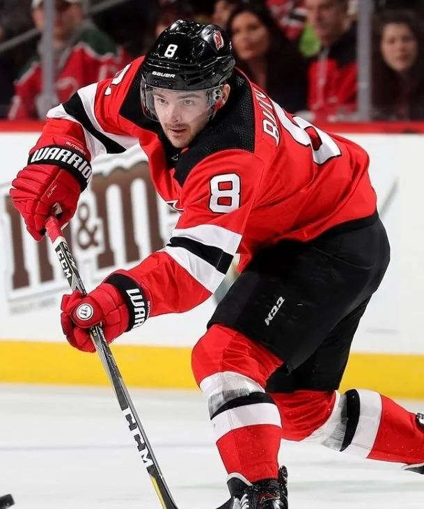 Will Butcher playing hockey