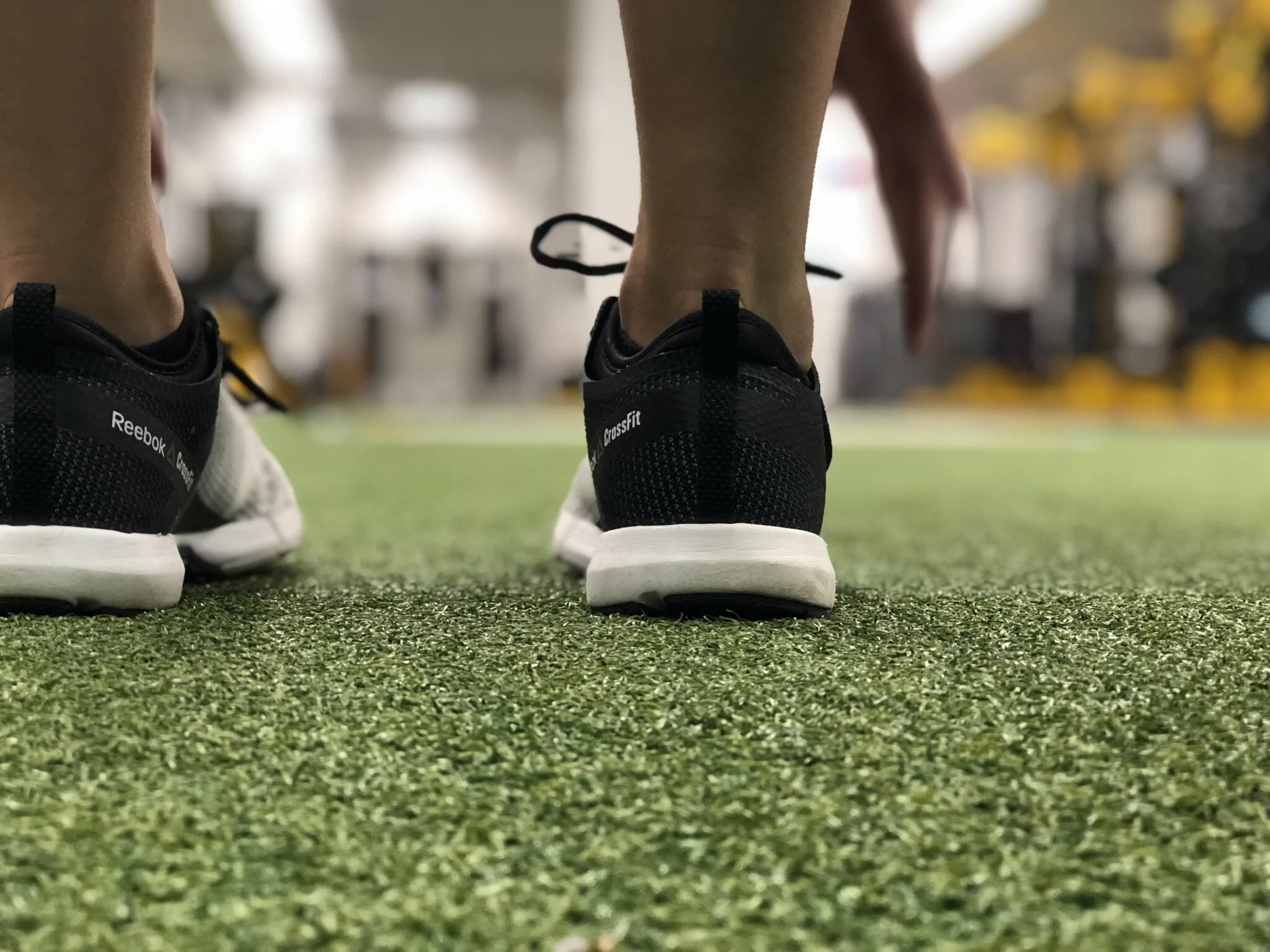 Running shoes on training field