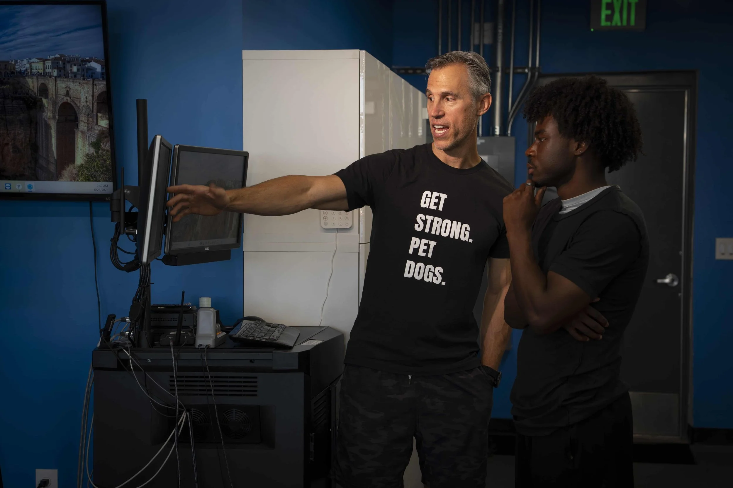 Dr. Studholme explaining running gait analysis test results in Denver CO