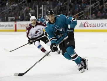 Dylan Gambrell playing hockey