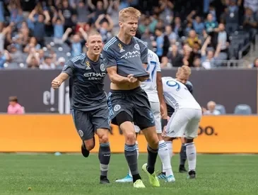 Keaton Parks and other players playing soccer
