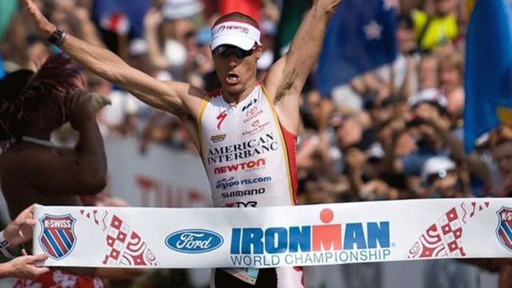 Craig Alexandar crossing the Ironman World Championship finish line