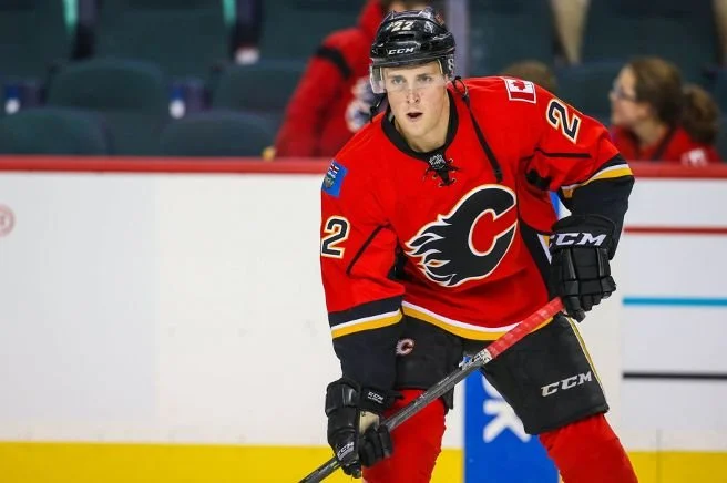 Drew Shore playing hockey