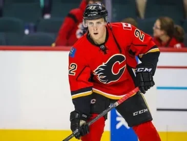 Drew Shore playing hockey