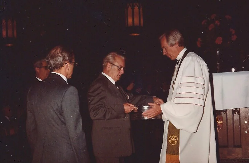 byron gives communion.jpg