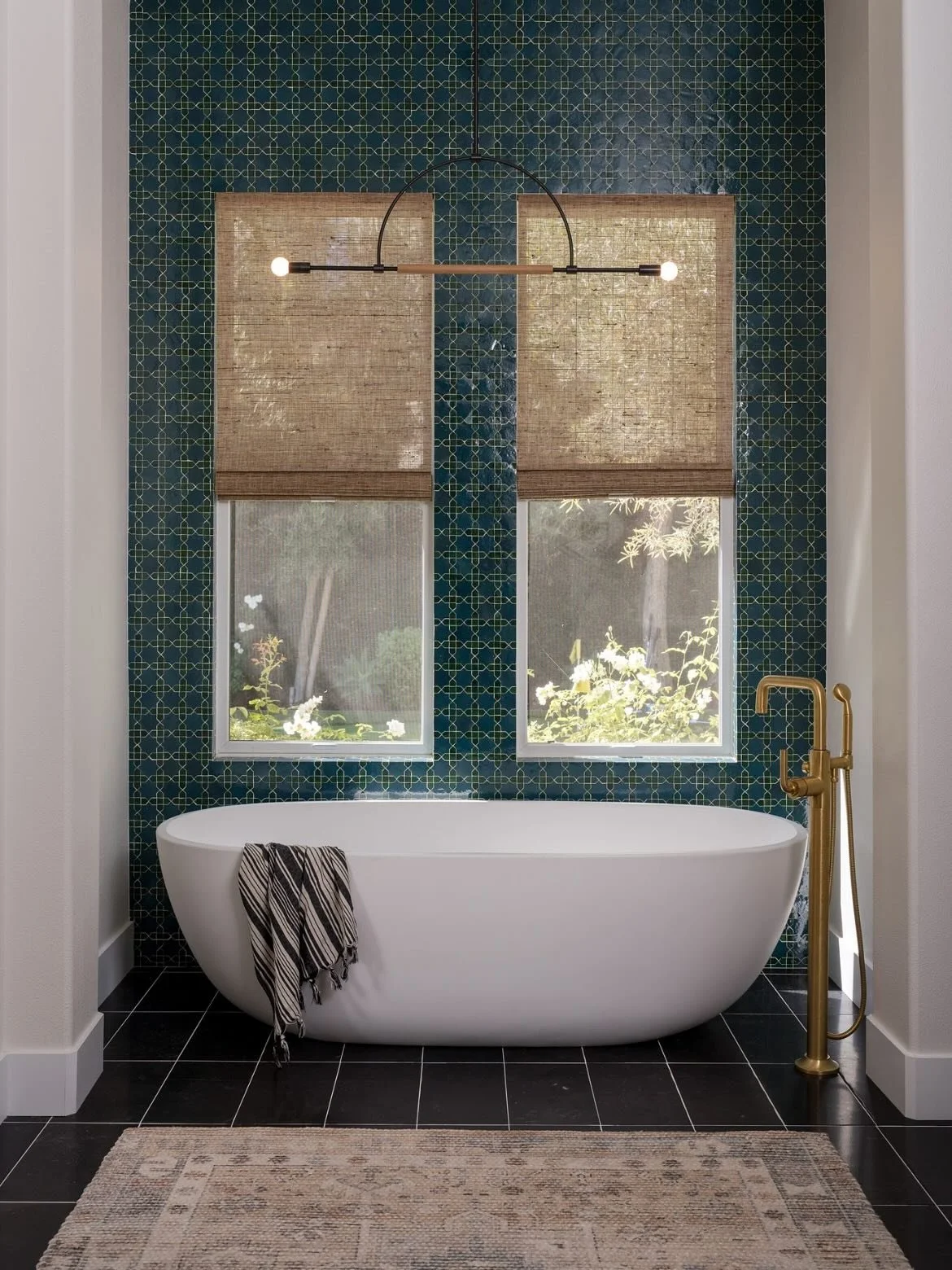 A picture says a thousand decisions.
How many went into this one small corner of a primary bathroom? Let&rsquo;s just say&hellip; A LOT!

From the ground up:
1. New floor plan to open up the space for this cozy tub nook
2. Squared off all bullnose ed
