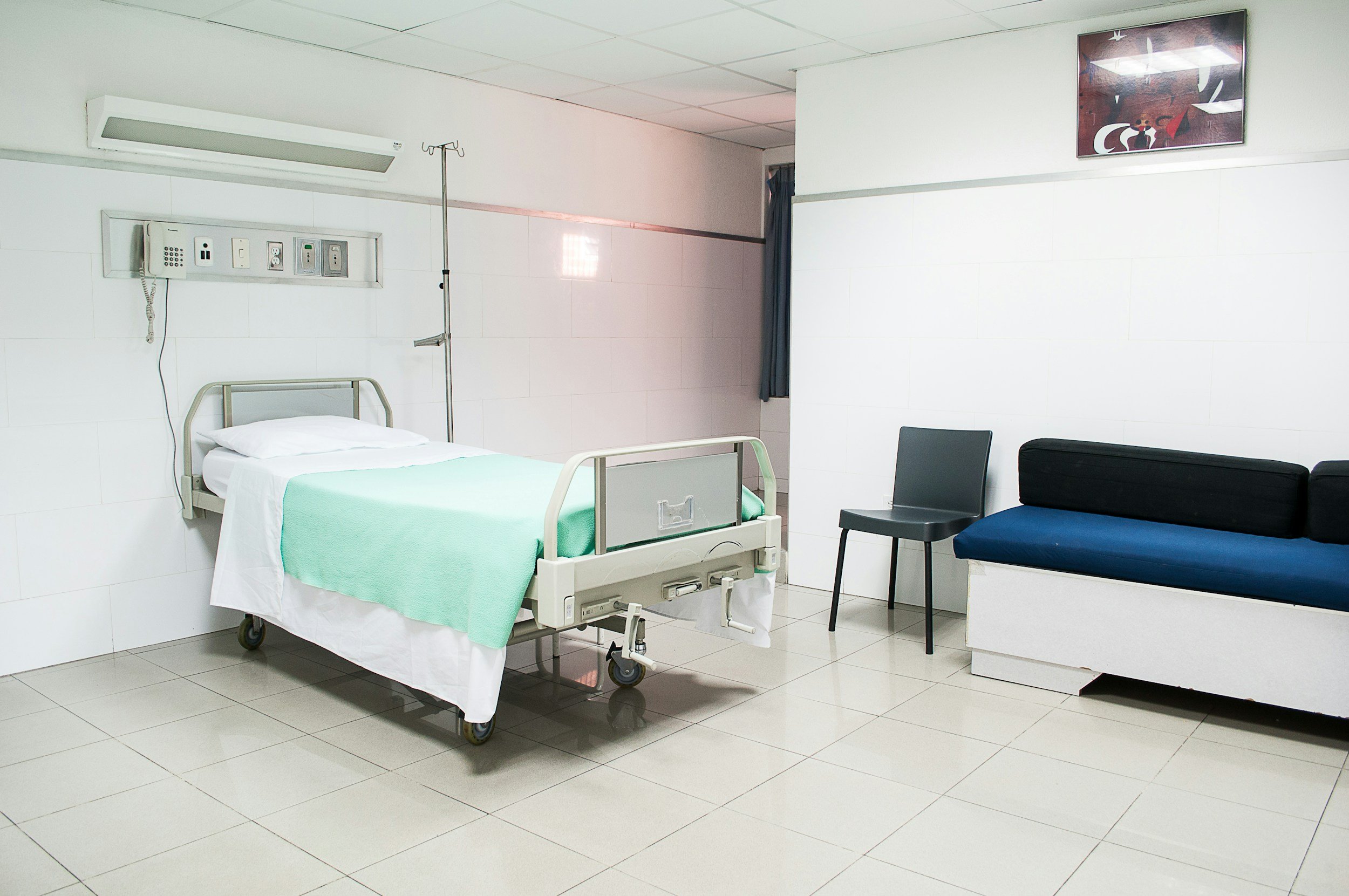 Hospital Room with an empty bed
