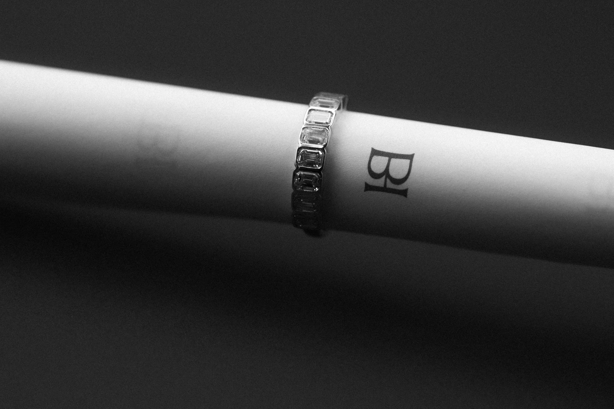 Honeybelle_Ring-7nine_emerald_cut_bezel_diamonds.jpg