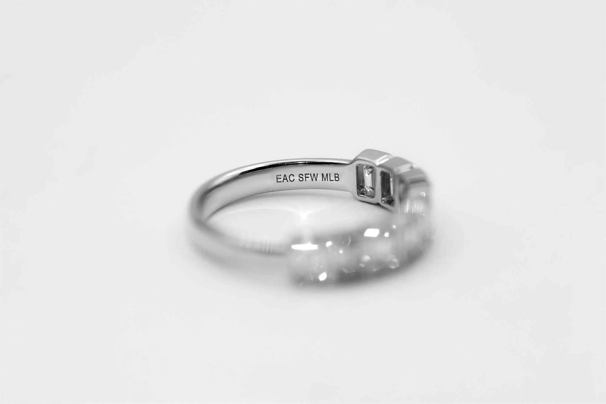 Honeybelle_Ring-5nine_emerald_cut_bezel_diamonds.jpg