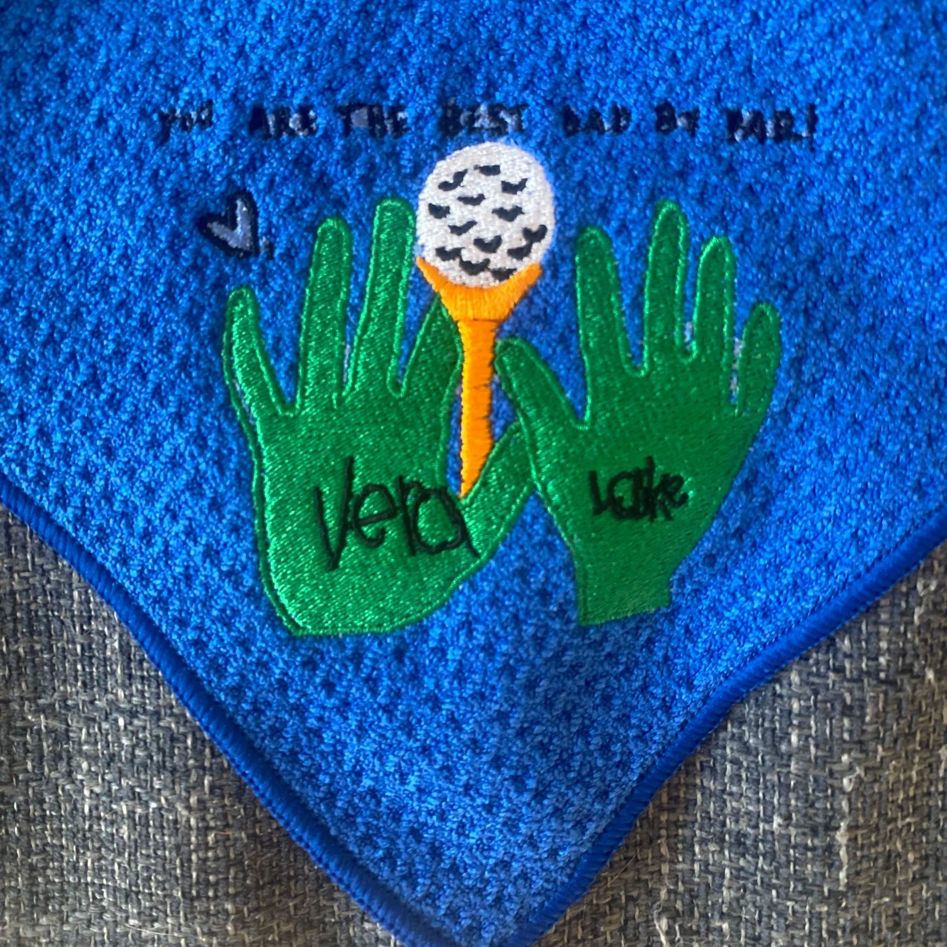 Custom child artwork embroidered on a golf towel. The perfect gift for golfers.