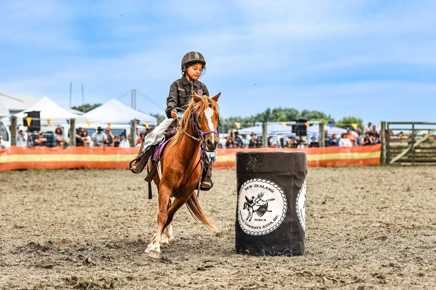 Acacia and Mahuika barrel racing in rodeo