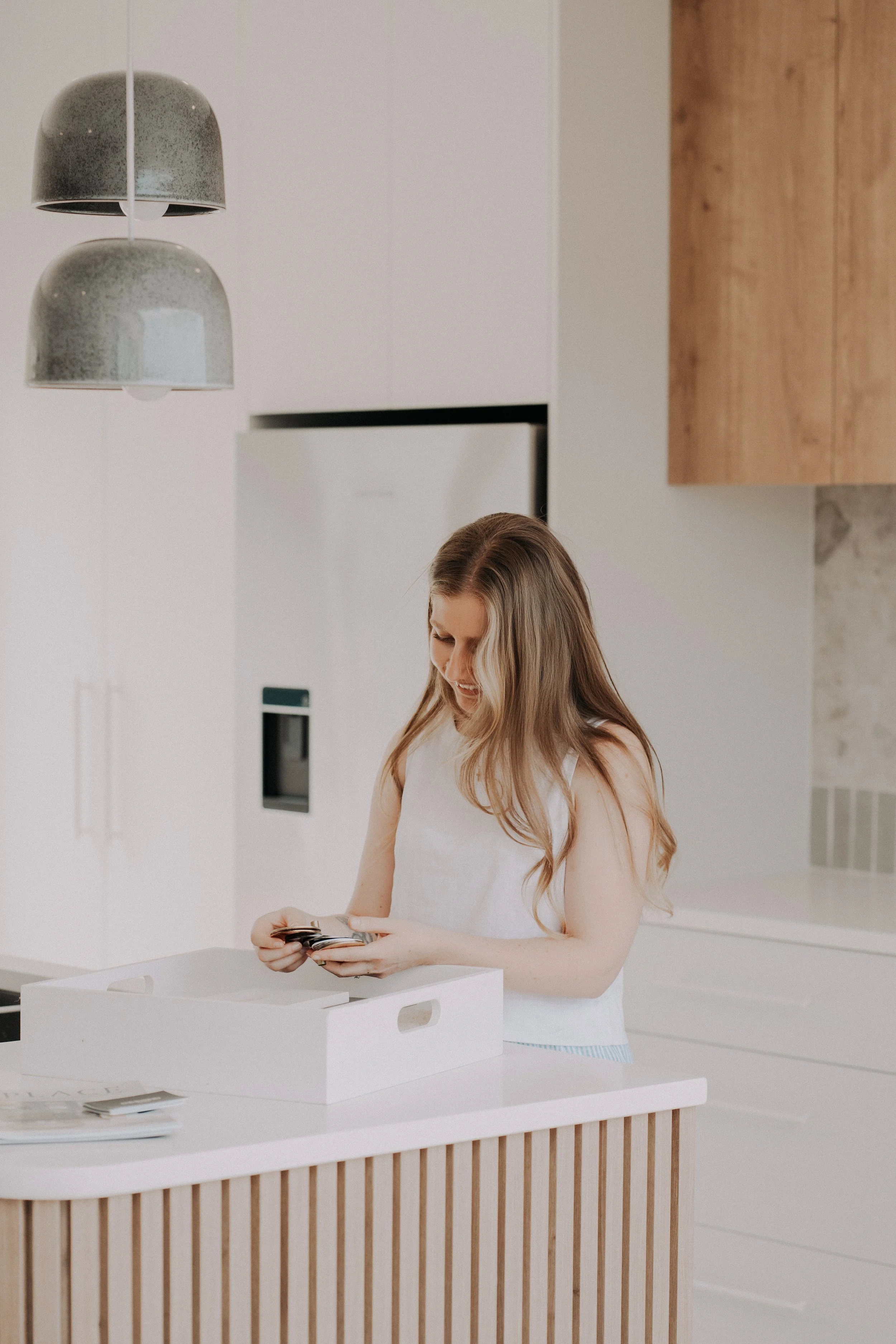 Designer arranging samples for a home renovation project