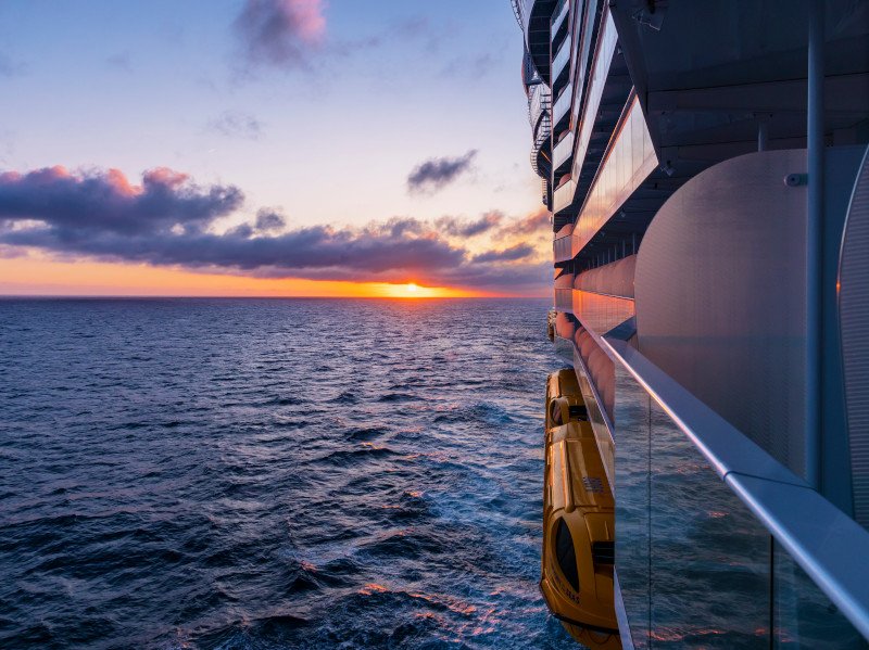 Ocean View of a sunset from a balcony on Symphony of the Seas