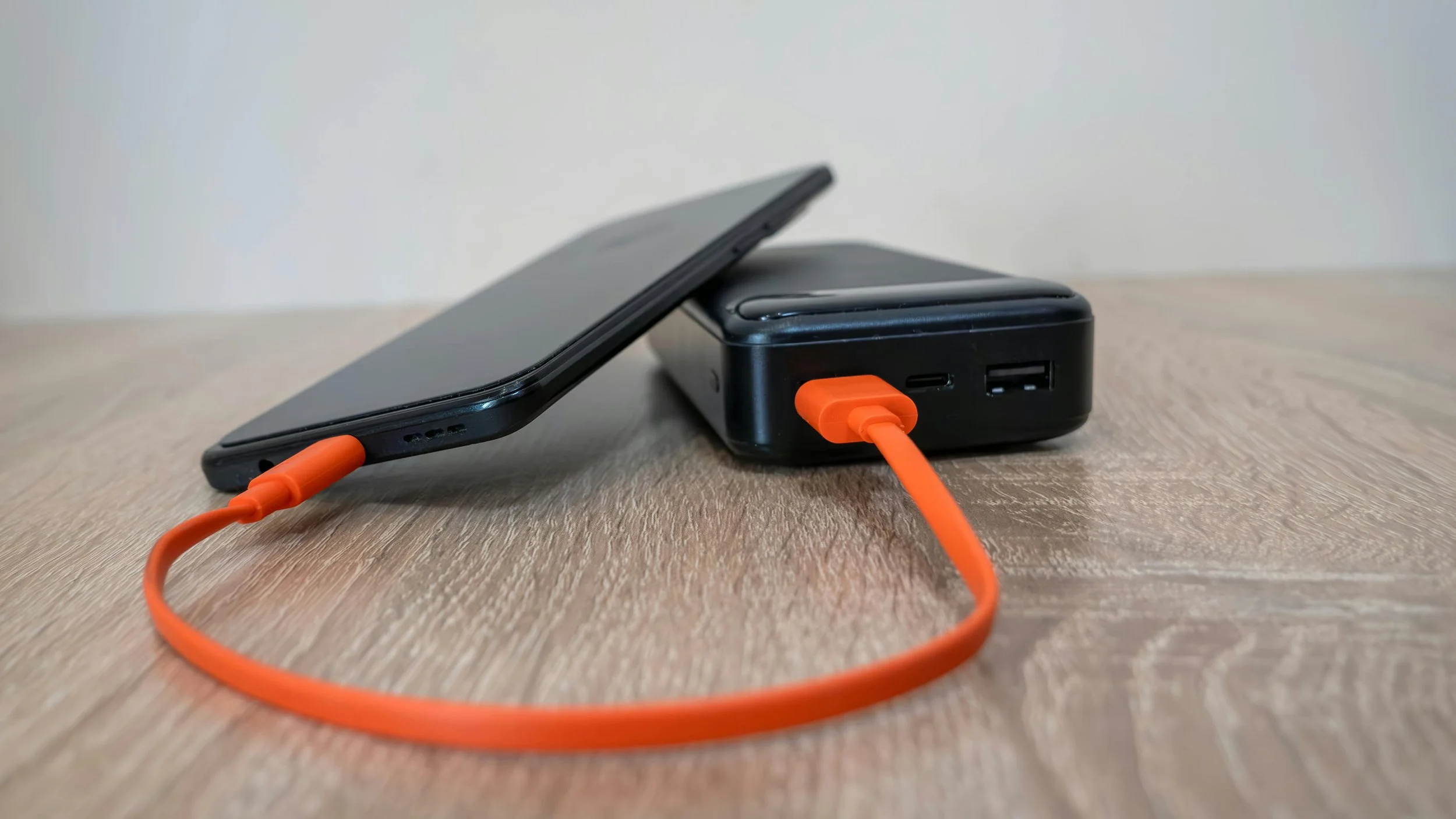 smartphone connected to a power bank