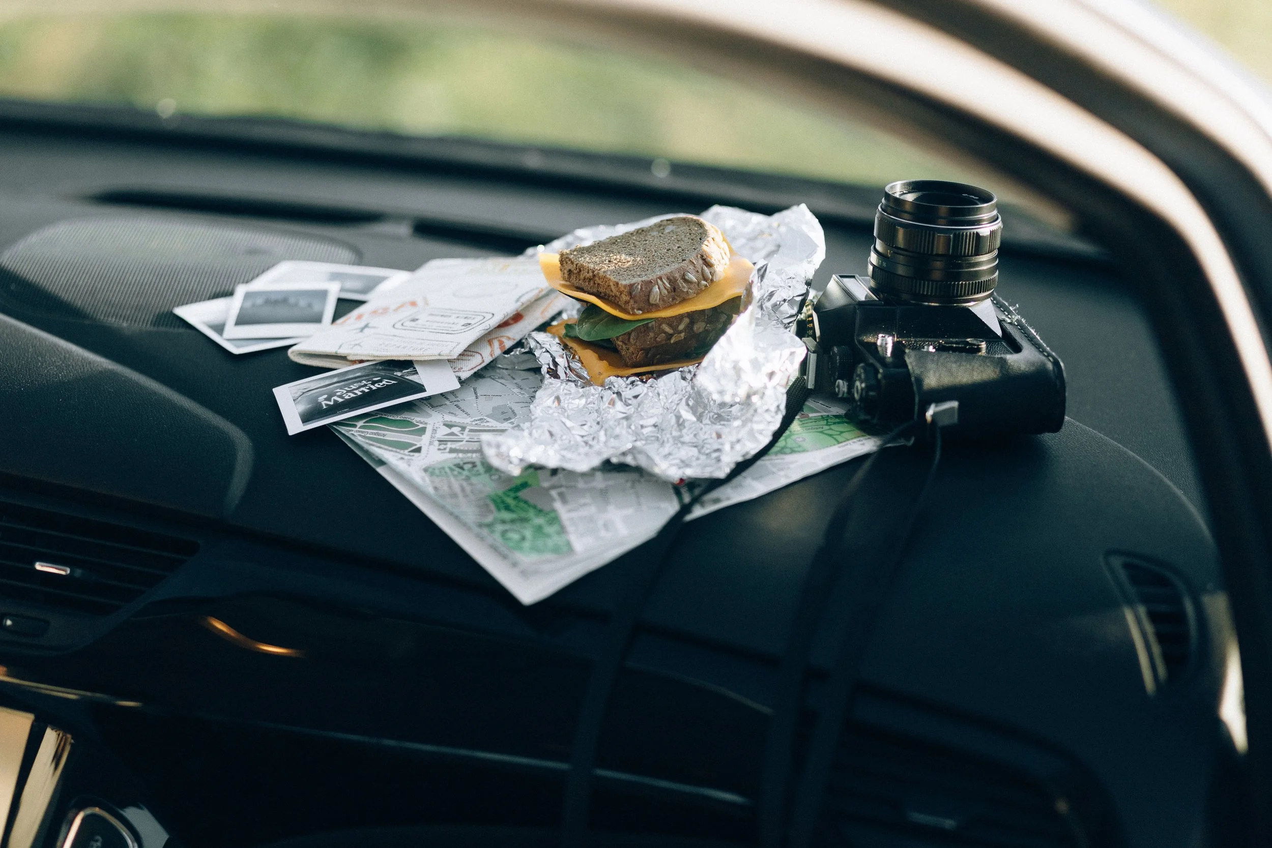 sandwich map and camera on car dash