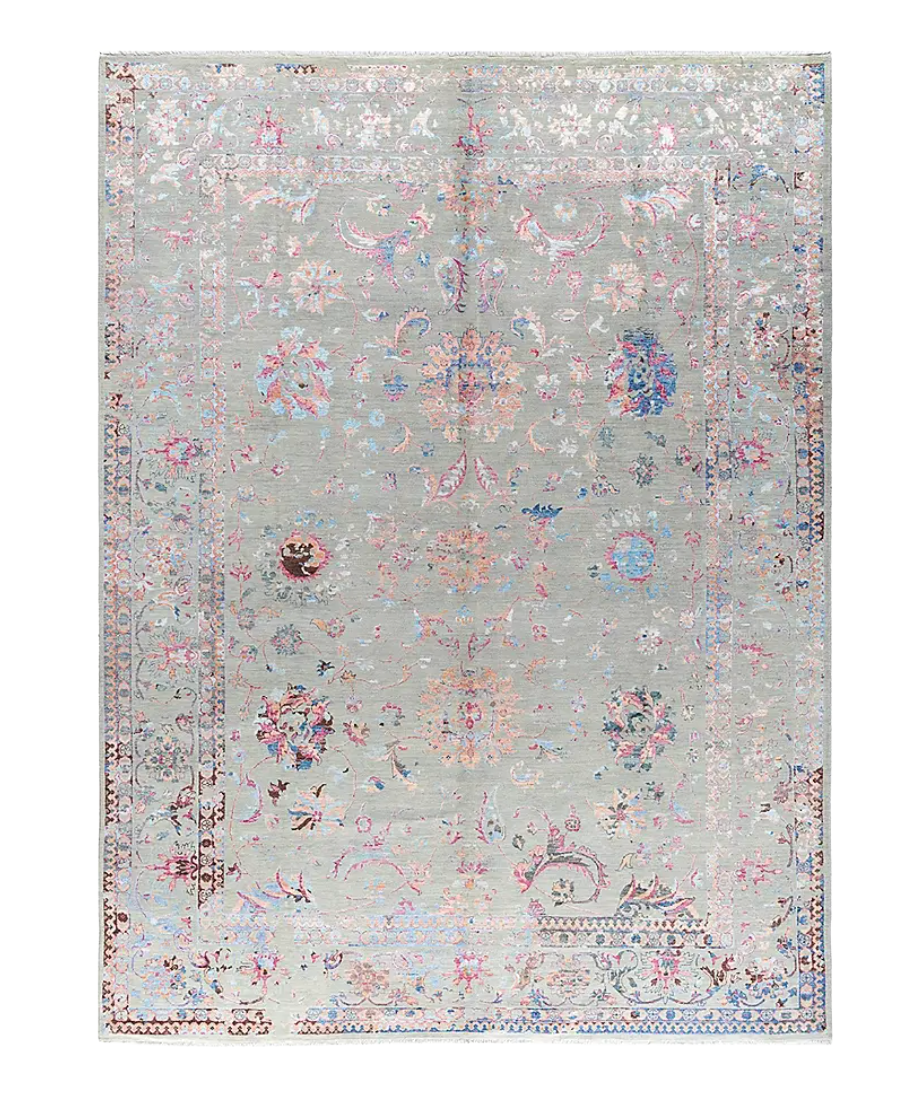 persian inspired wool rug with light grey to muted blue tones