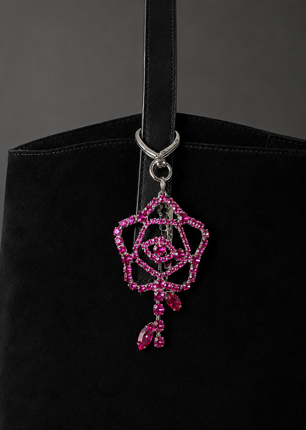 BAG CHARM 2 FUCHSIA ON BAG 1.png