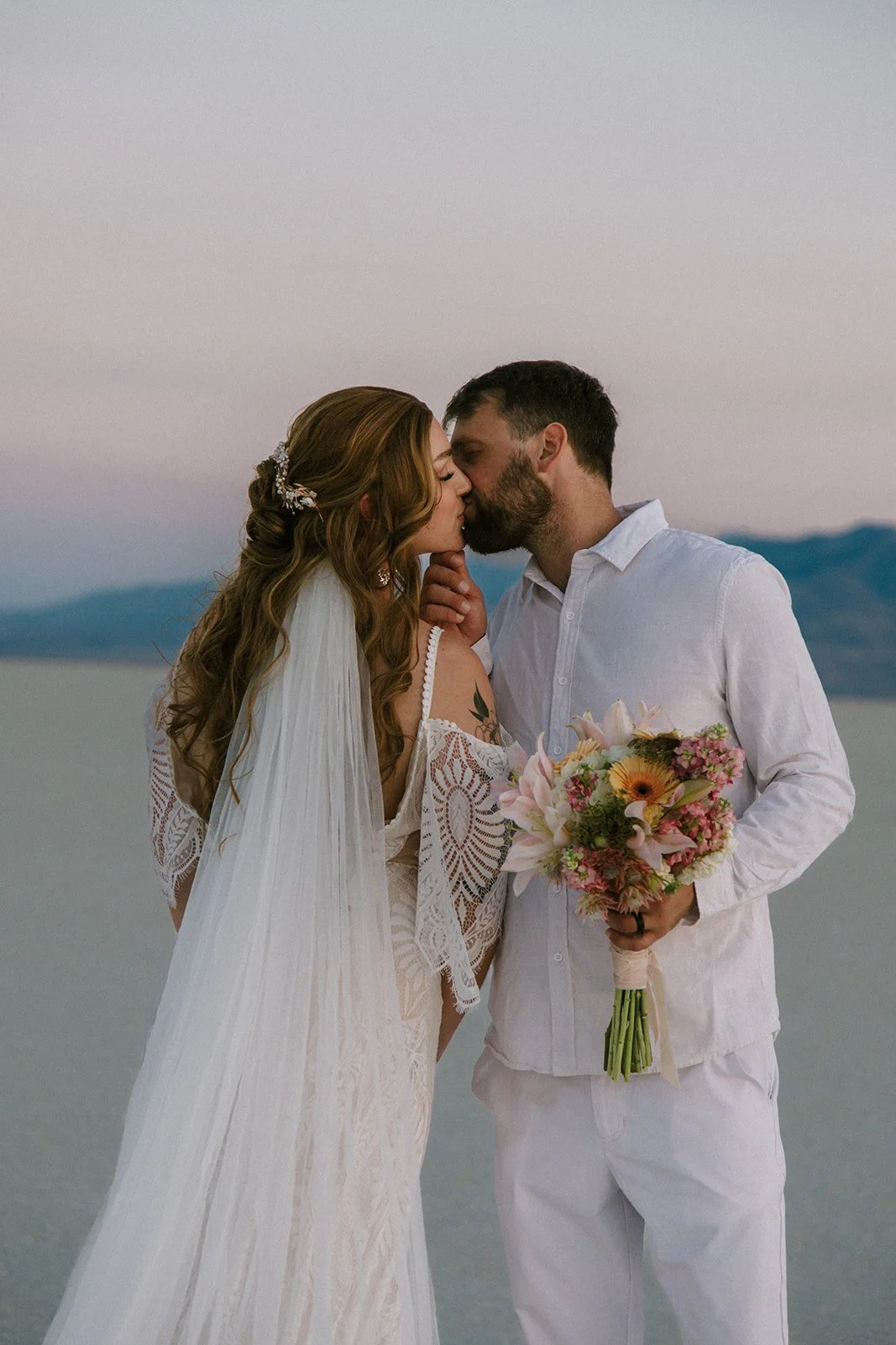 molly and joe kiss salt flats.jpg