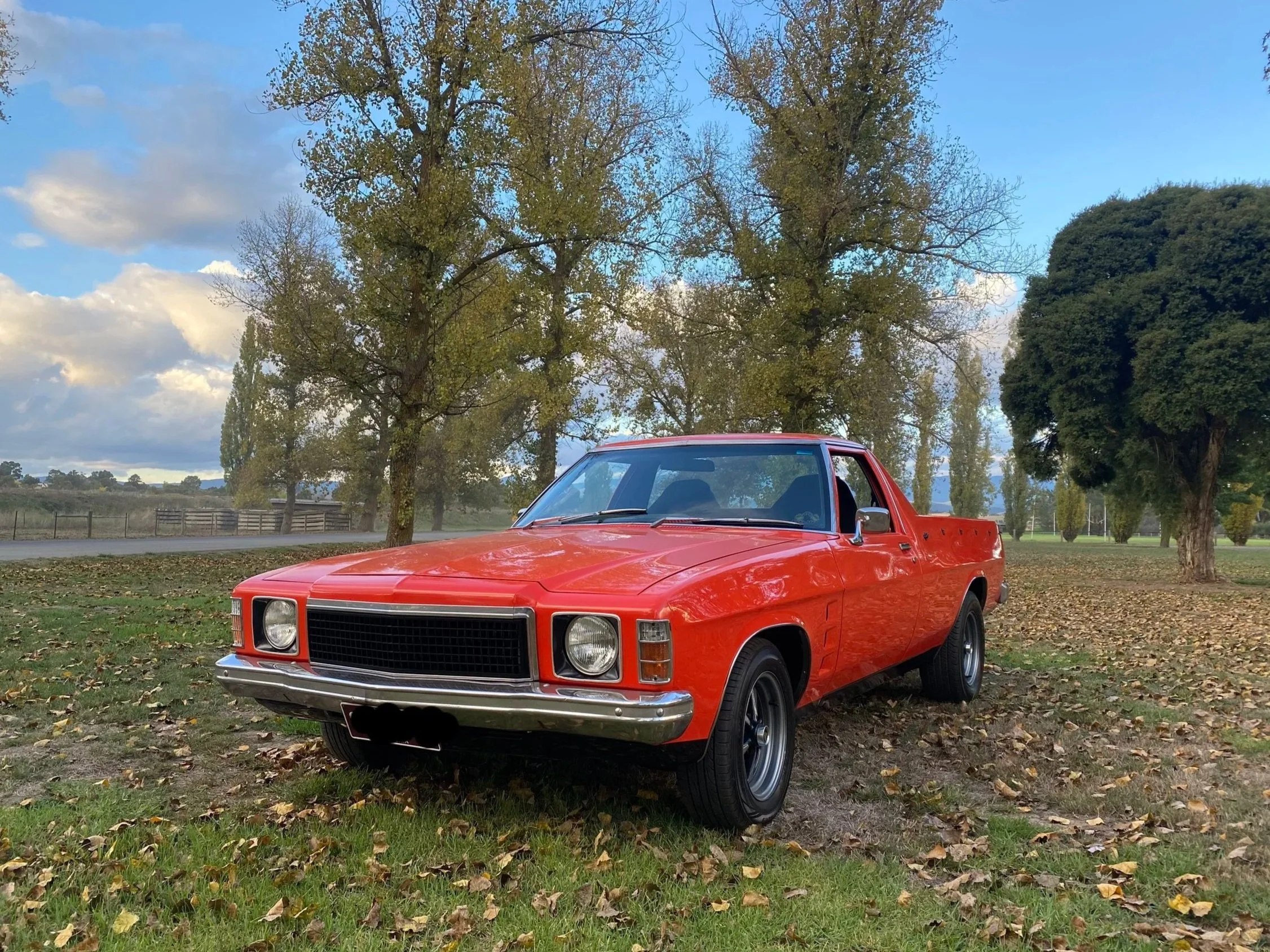 Mel's HZ Ute,
1980 HZ Kingswood, 6 cyl 202, T5 Manual. 
Original GTS style rims, custom Orange paint. The girls think its a bit too bright so some black or chrome incoming? Who knows mate.