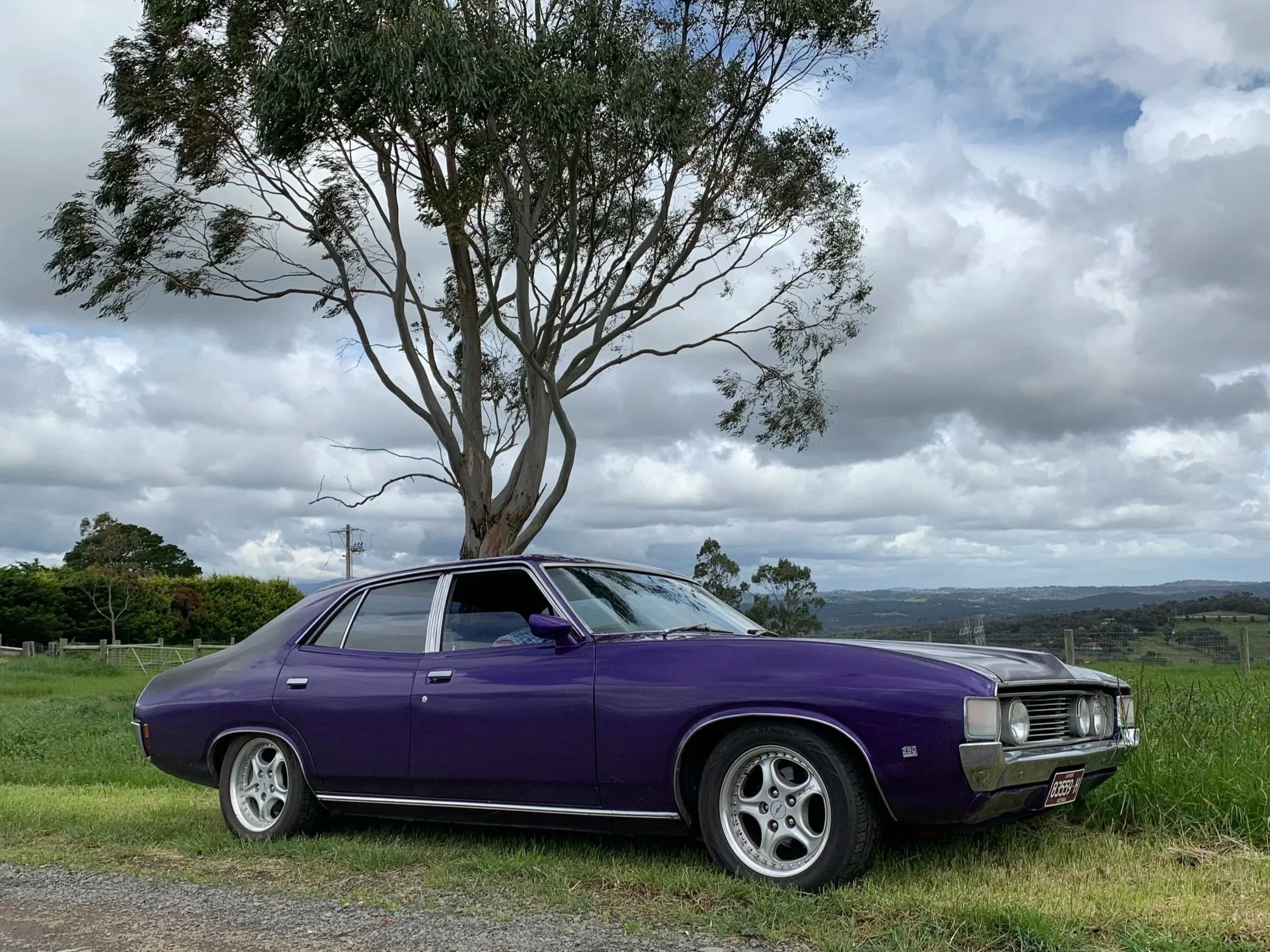Russ's XA,
1973 4 Door XA Falcon, 250 2V, T5 manual, Borg Warner Diff.  
Russ is always trying to keep it clean, so the kids aren't allowed in it but the dog definitely ignores that rule!