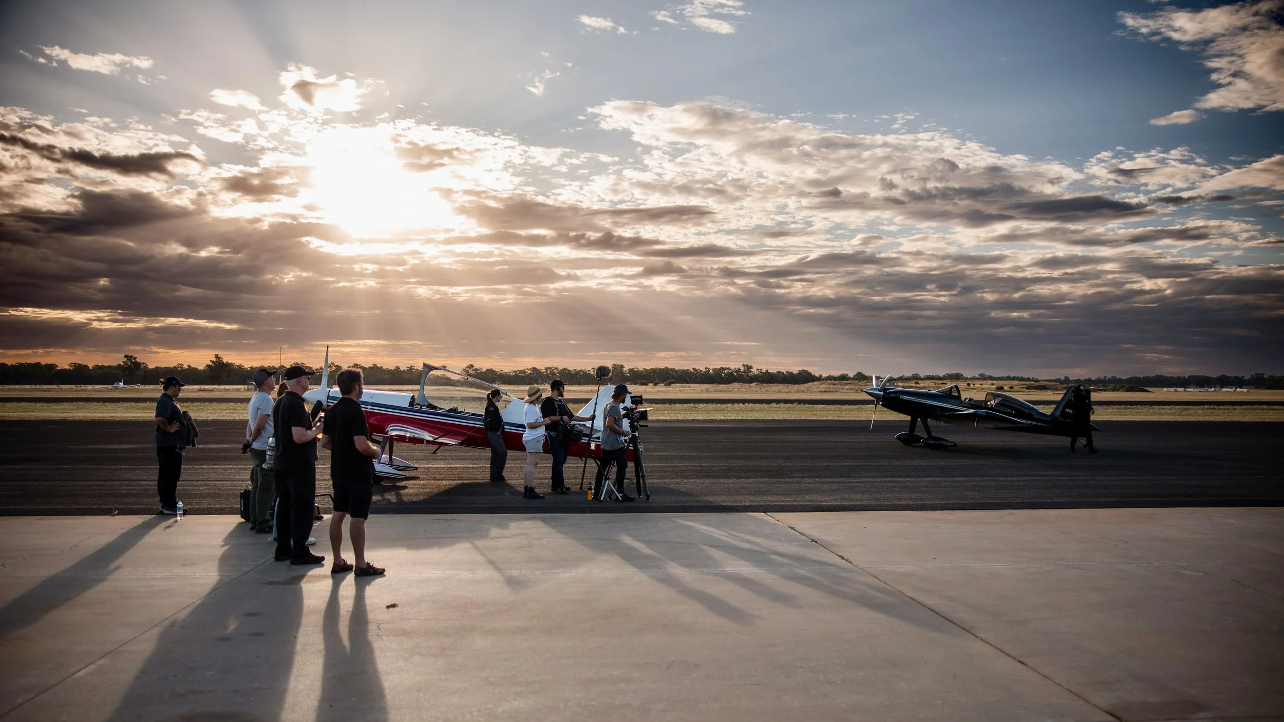 40_BTS_Home_STILLS_Crew_with_Planes.jpg