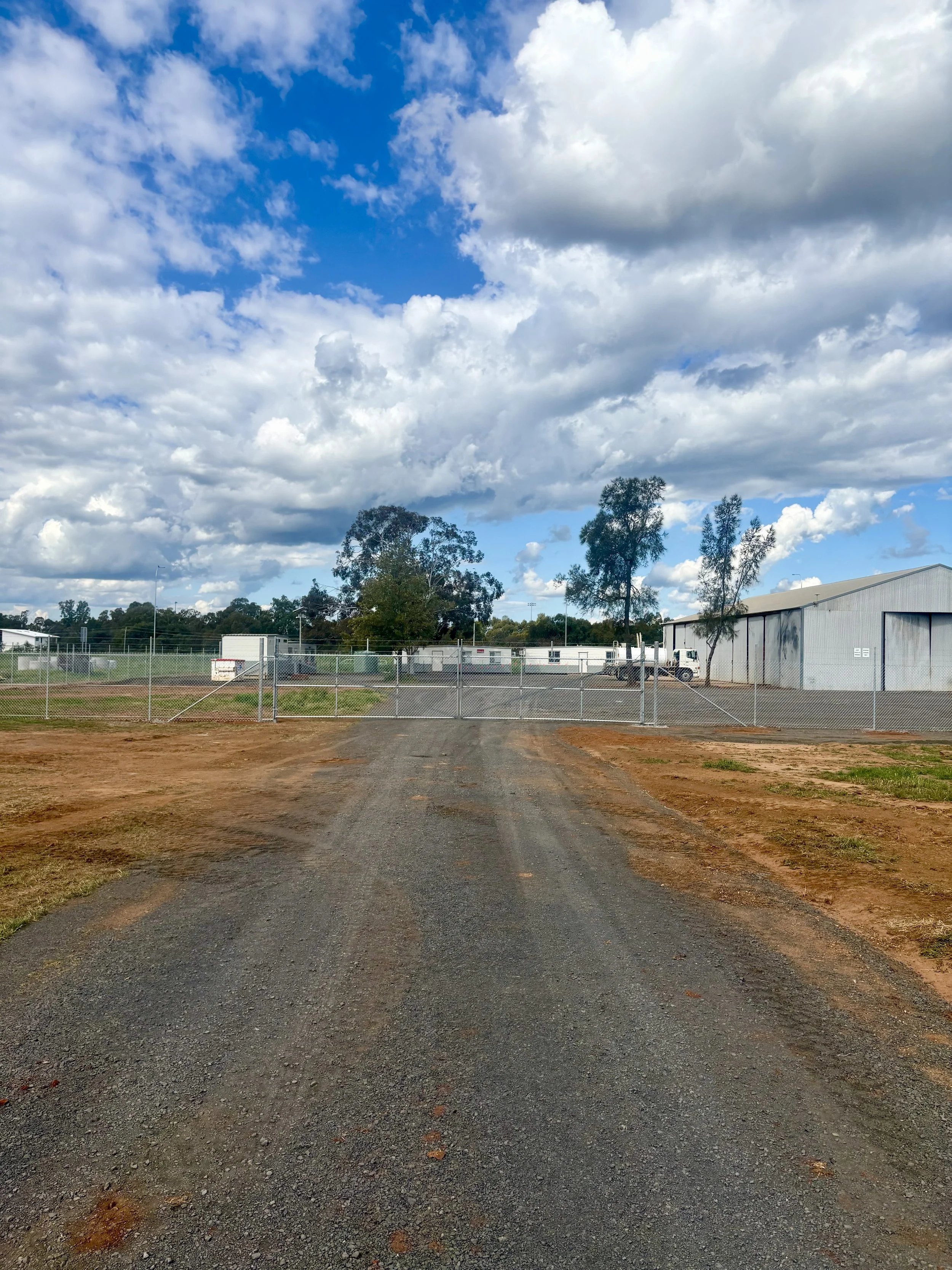 Front view of double opening security gate of machinery yard installed by TG Wheeler Contracting