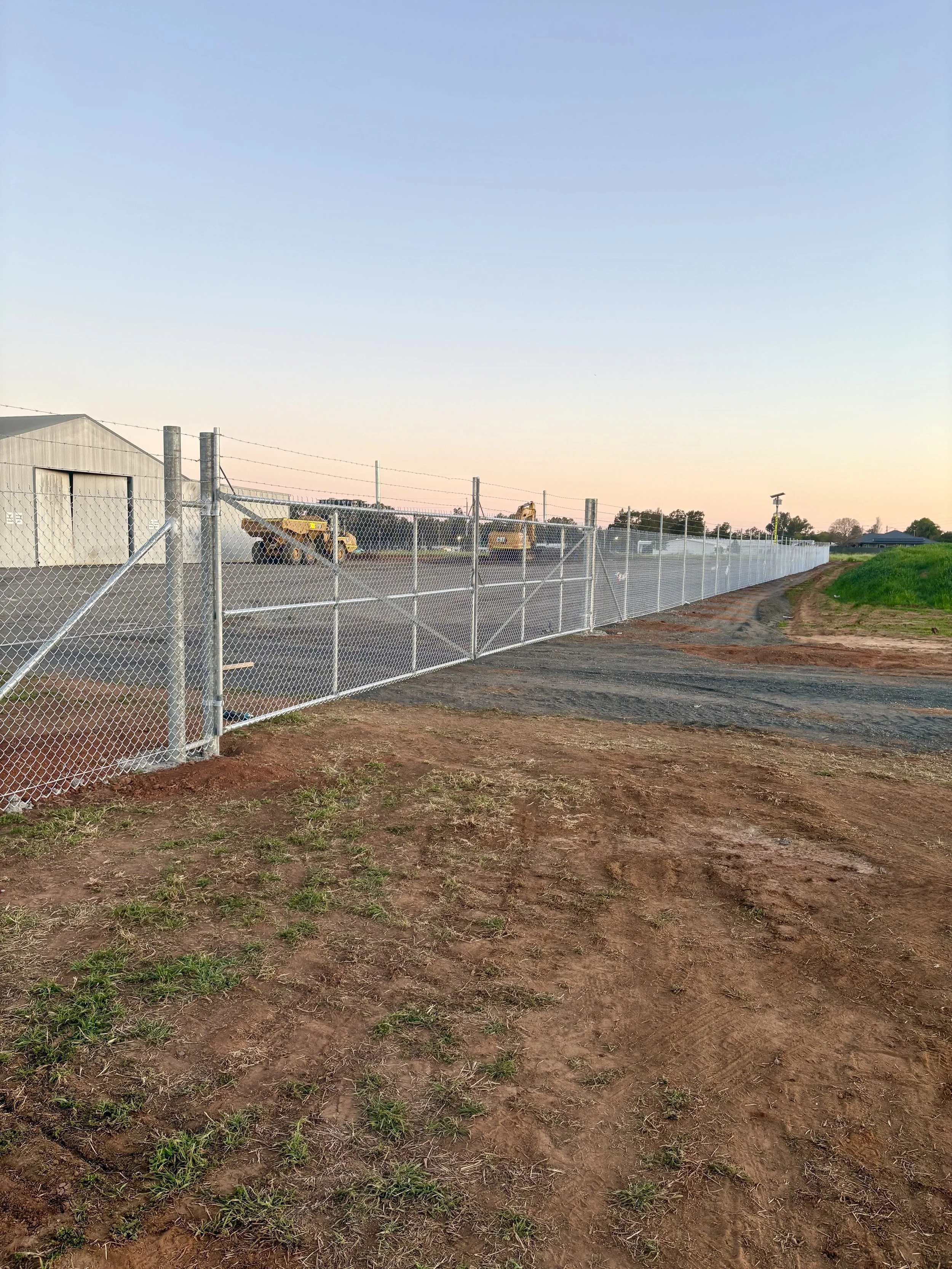 New job chainwire security gate front entrance to compound by TG Wheeler Contracting