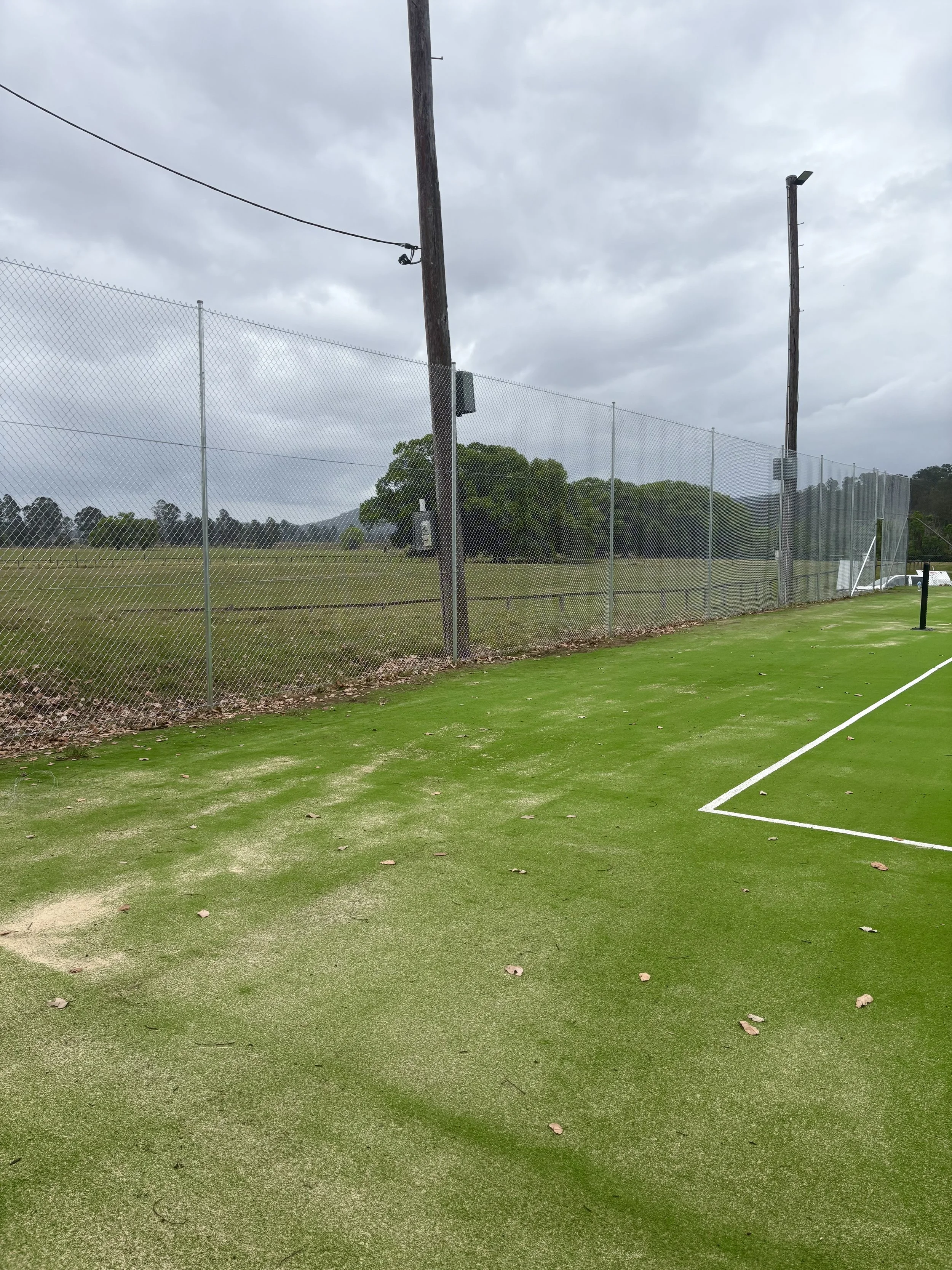 3.6m high tennis court fence with 4 plain wires installed by TG Wheeler Contracting