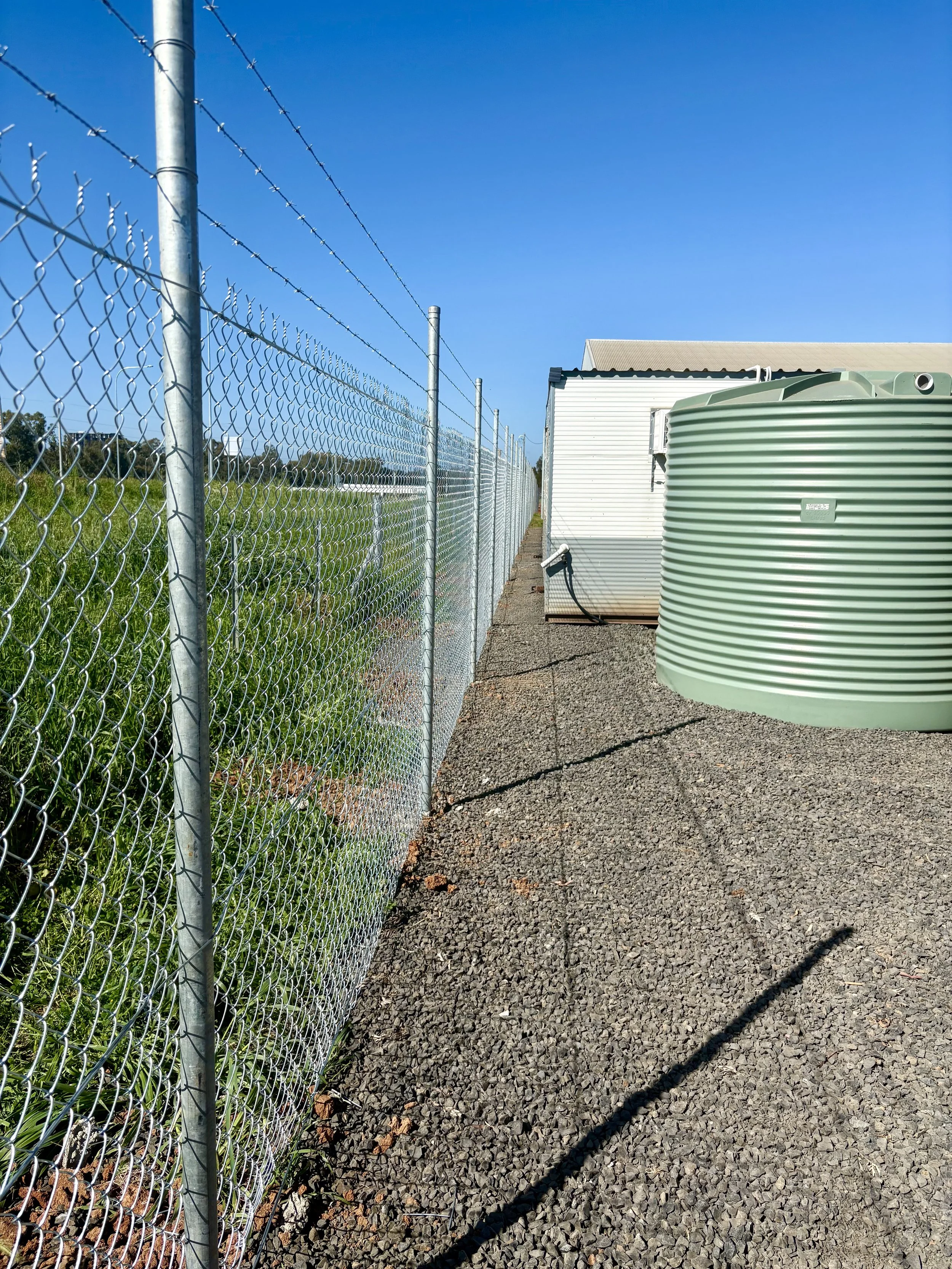 1800 high chainwire fence featuring 3 belly wires and 3 barb wires on top Clarence Valley NSW
