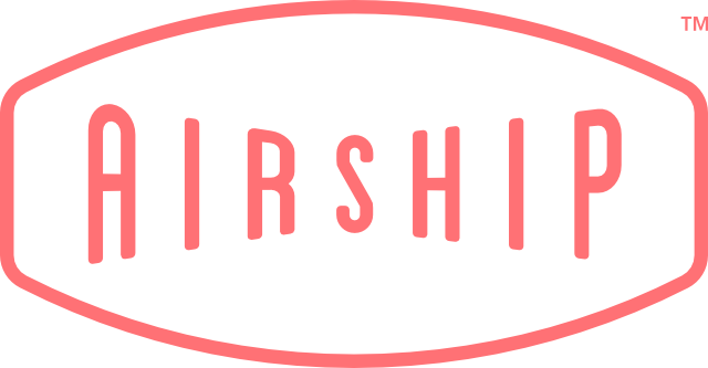 Logo with the word 'AIRSHIP' in pink capital letters inside an elongated black oval with a pink border.
