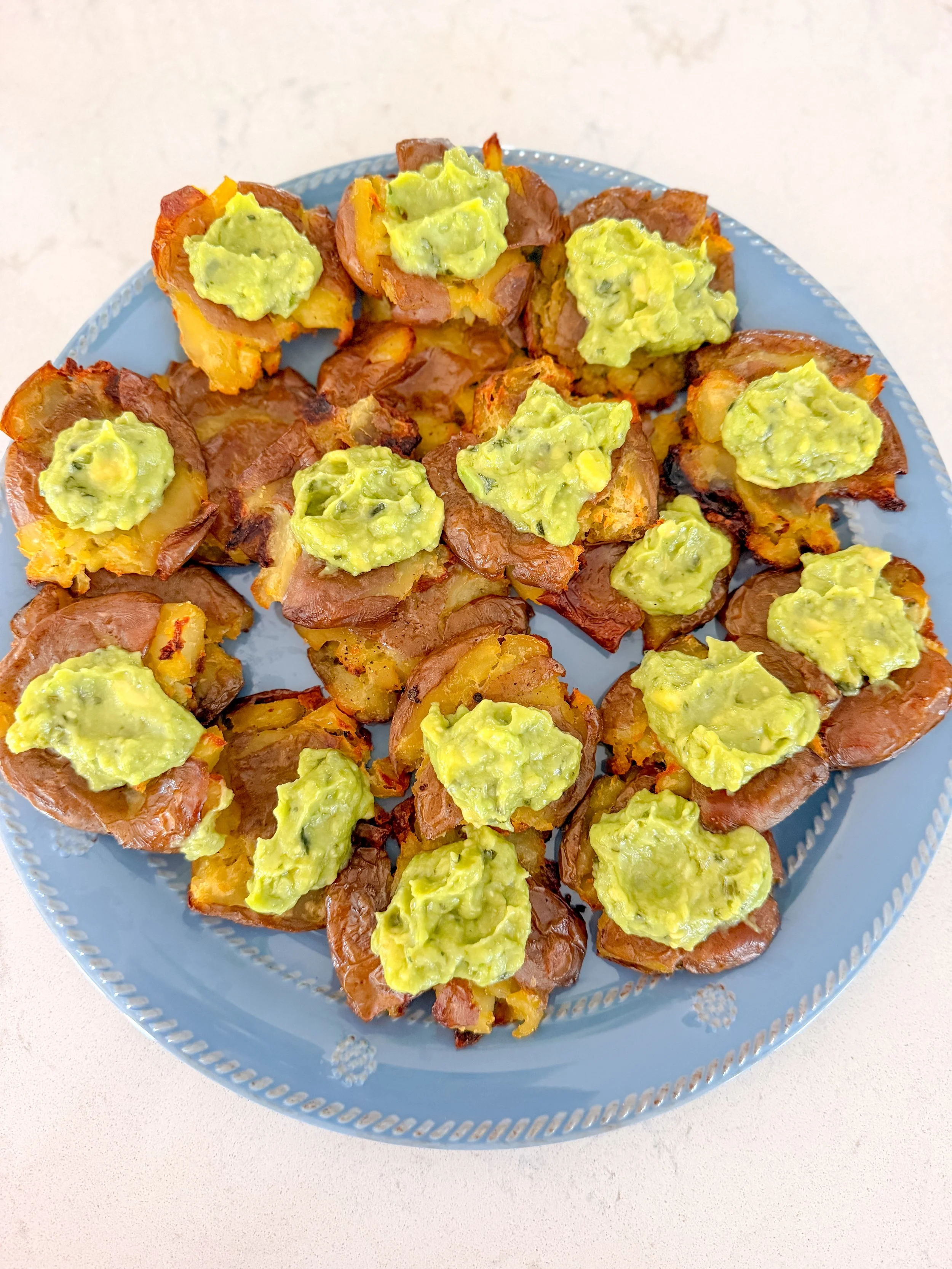 Crispy Smashed Potatoes with Avocado Lime Crema