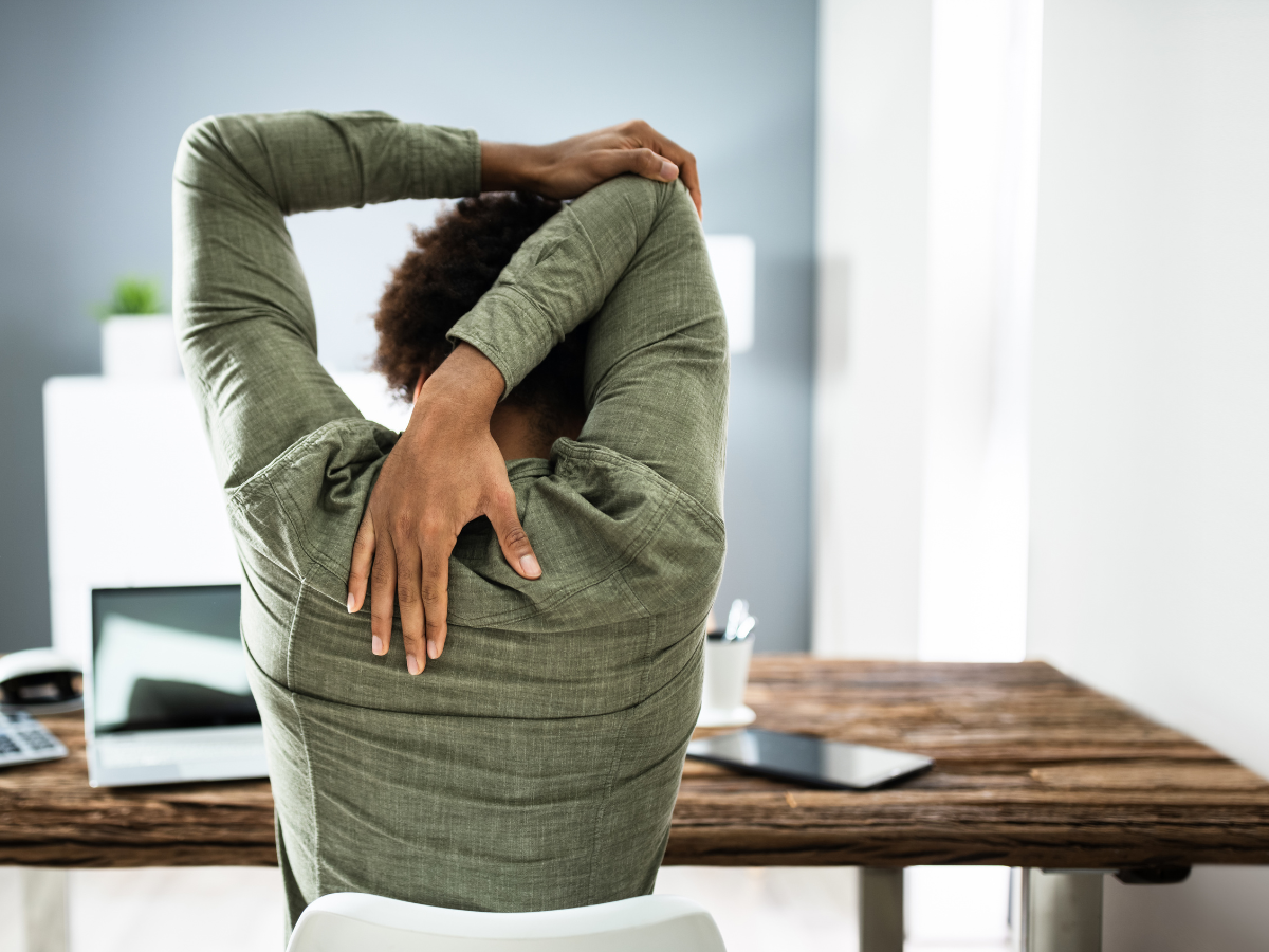 Stretching upper back and shoulder tension.