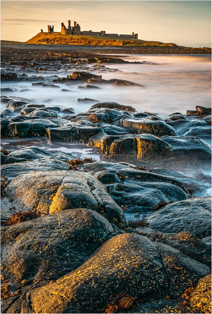 Late afternoon Dunstanburgh by David Hawkins