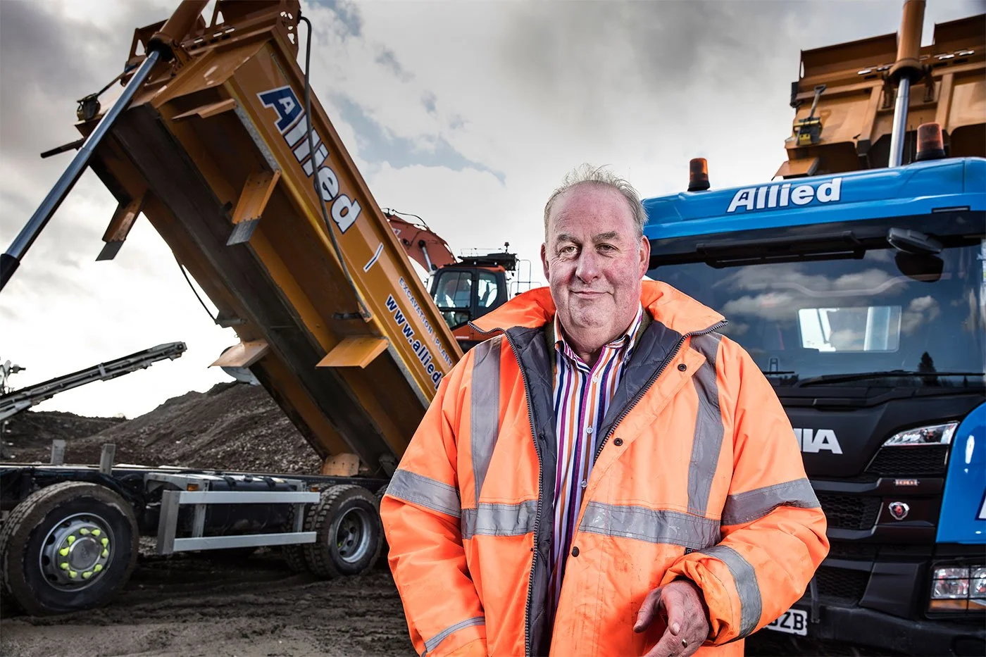 Man with tipper truck