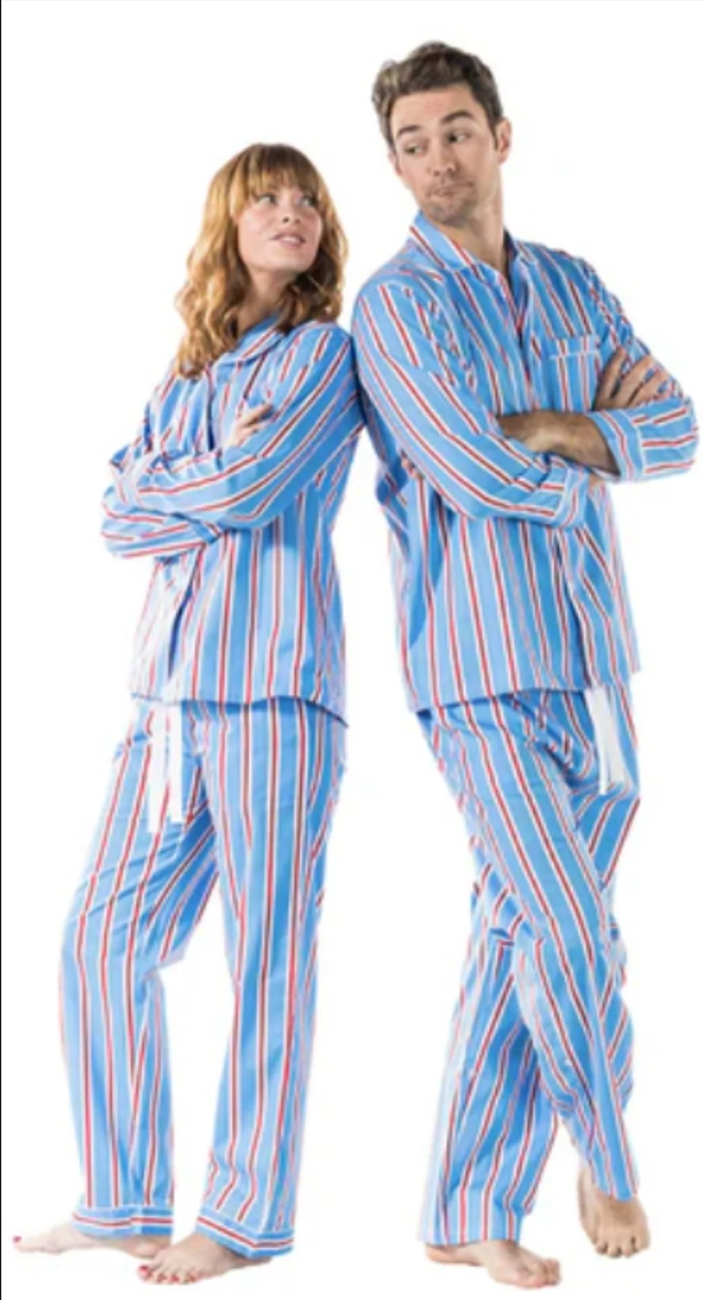 man and woman standing in blue pajamas