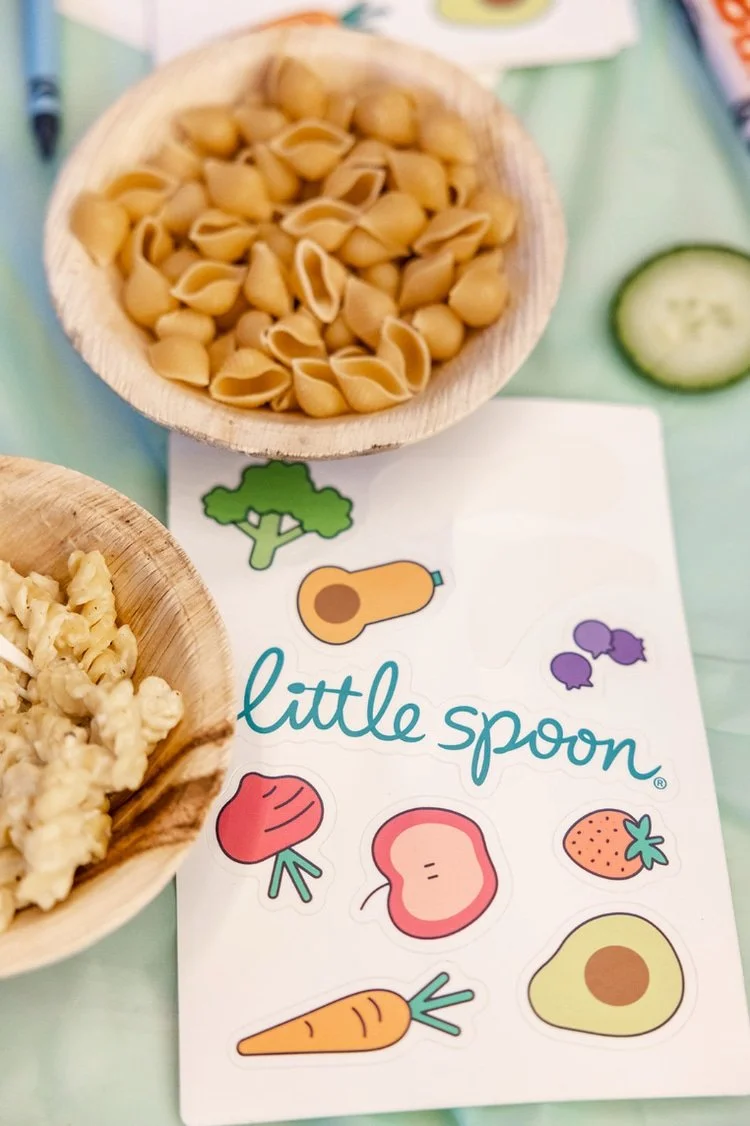 Little Spoon graphic with pasta products in bowls