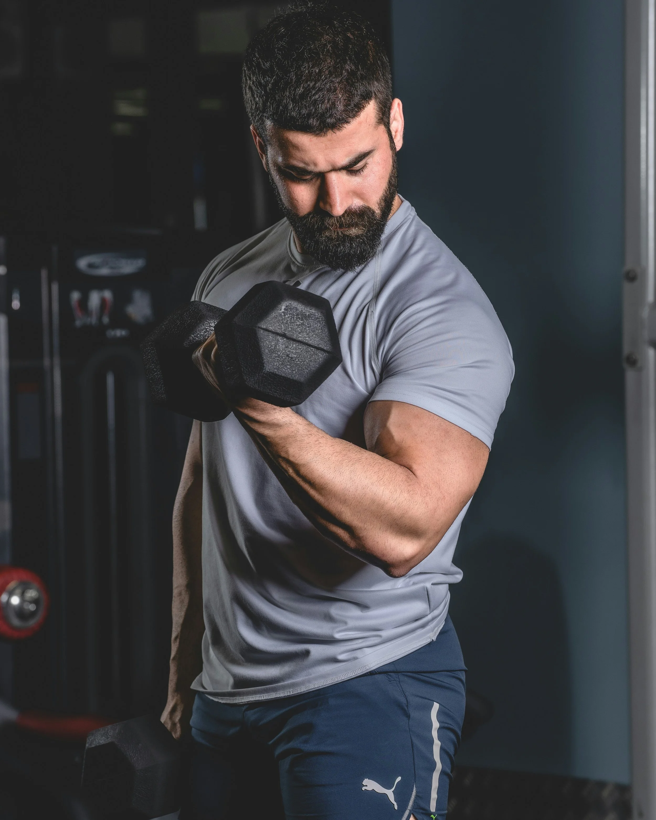 The Mind-Muscle Connection: Why "Squeezing" Matters More Than Moving the Weight